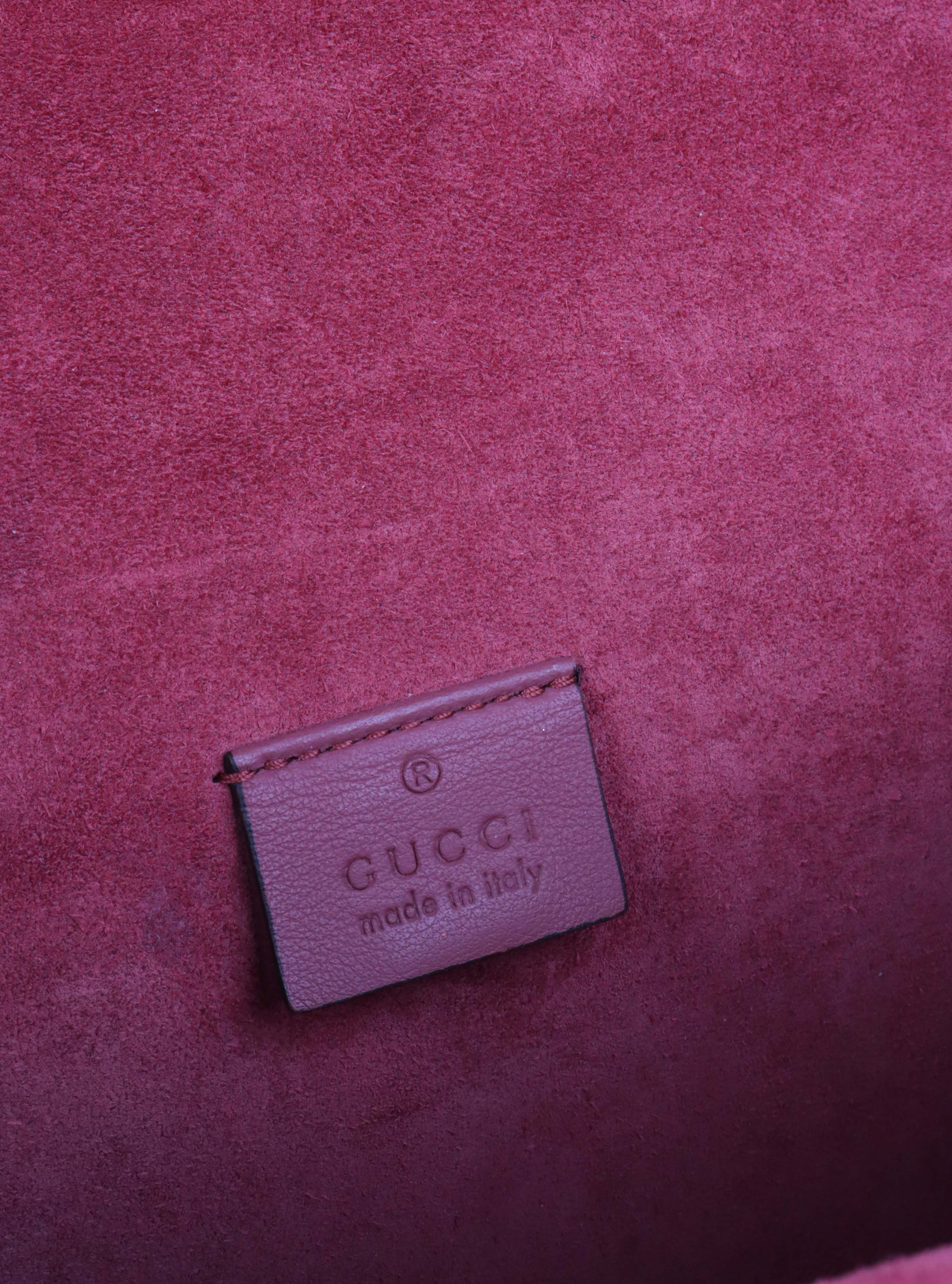 Gucci Small Dionysus Supreme Bloom Bag.