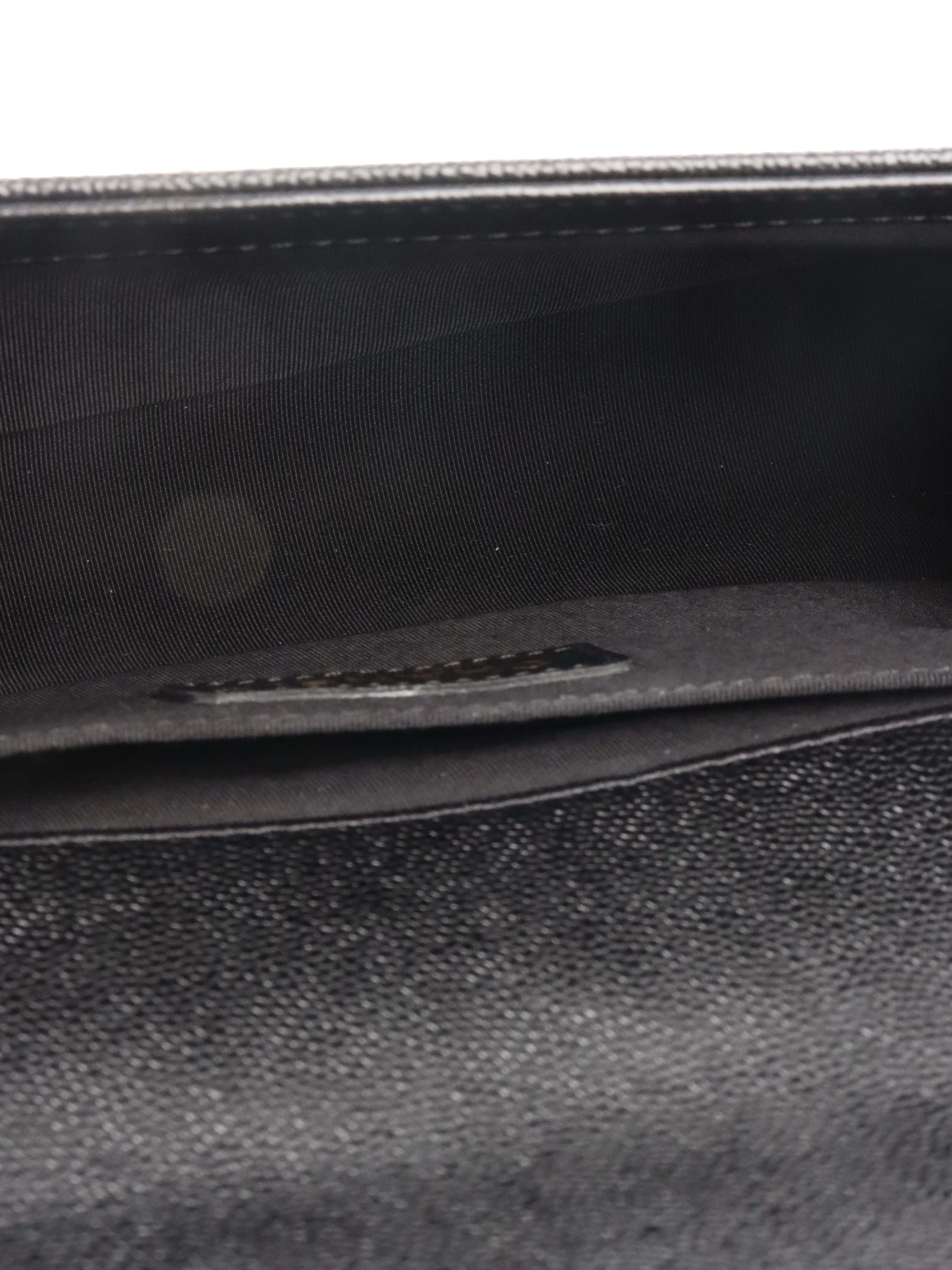 Chanel Black Chevron Caviar Medium Boy Bag.