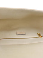 Louis Vuitton Cream Monogram Empreinte Saint Germain PM Bag.