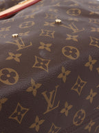 Louis Vuitton Atlantis GM Bag.