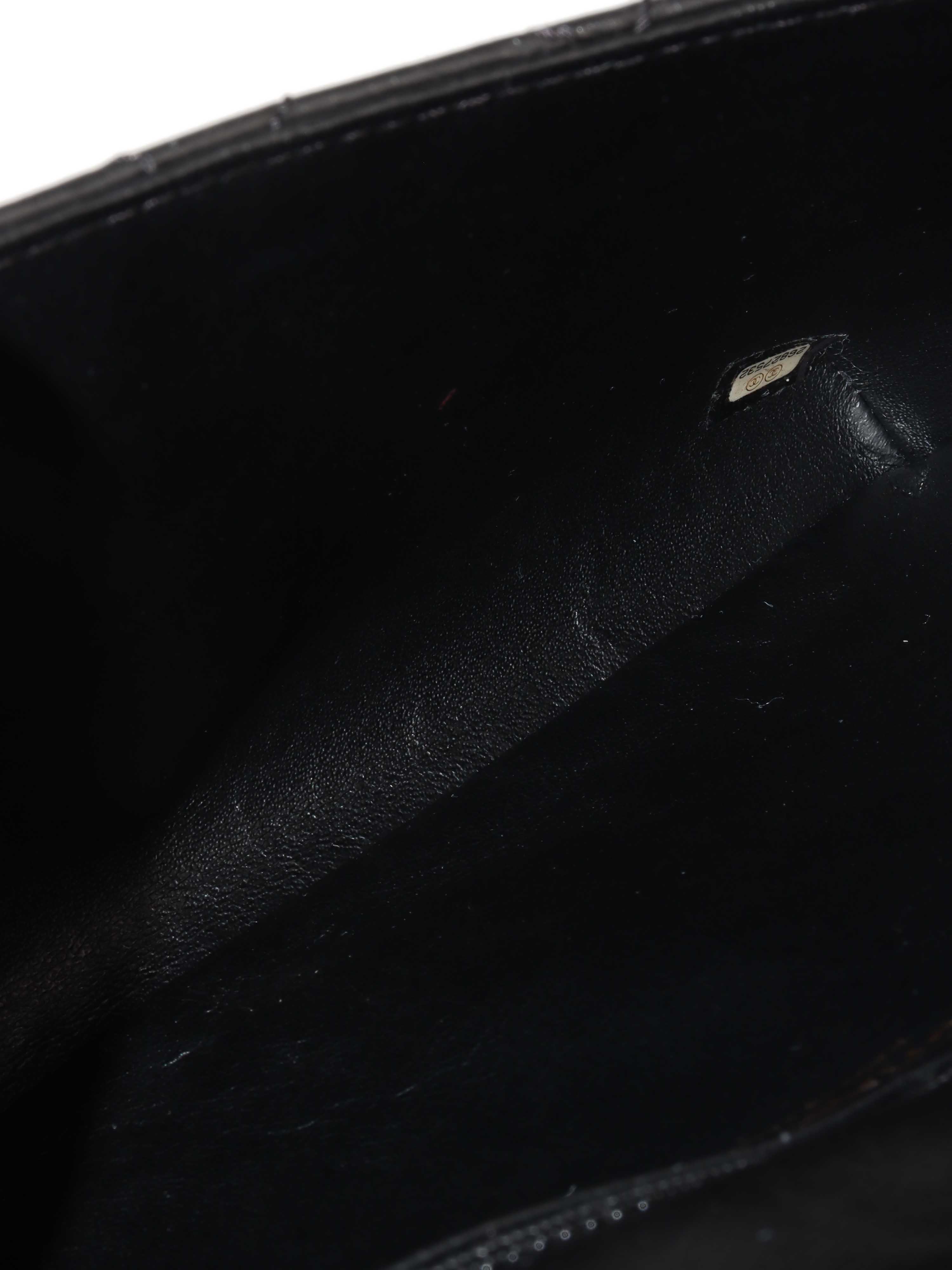 Chanel Black 2.55 Pouch.