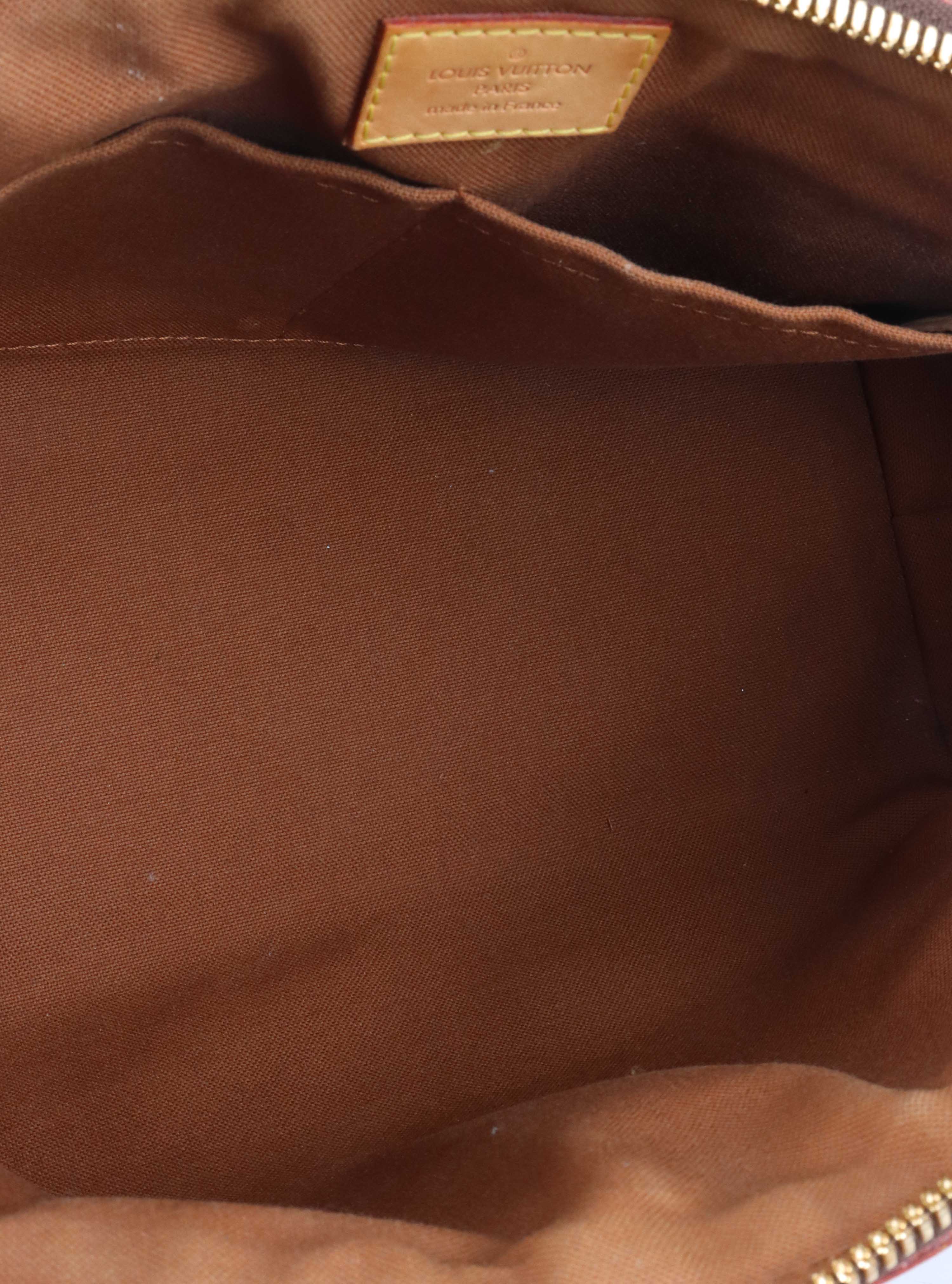 Louis Vuitton Monogram Tivoli PM Bag.