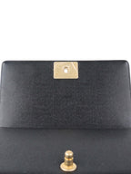 Chanel Black Chevron Caviar Medium Boy Bag.