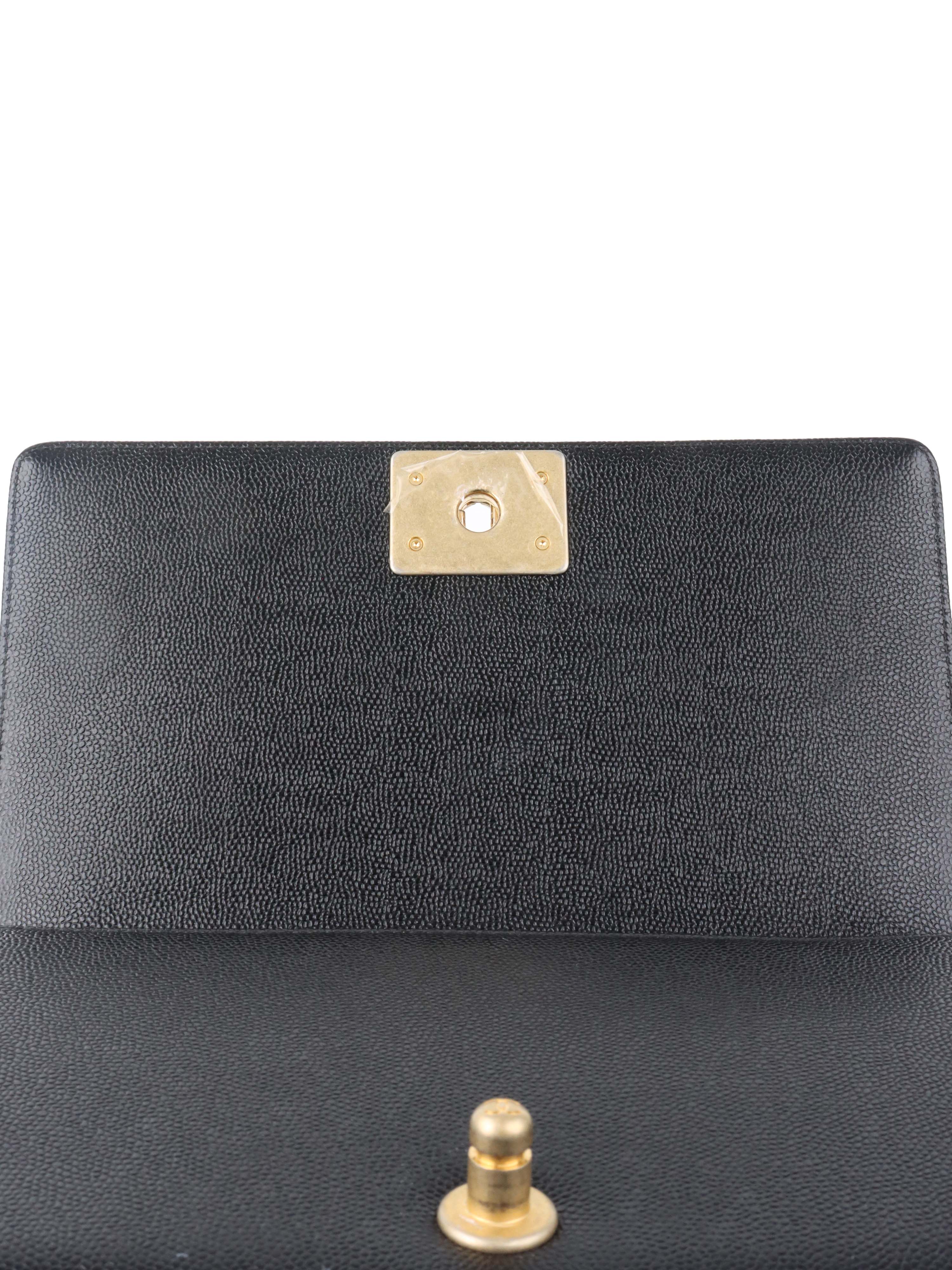 Chanel Black Chevron Caviar Medium Boy Bag.