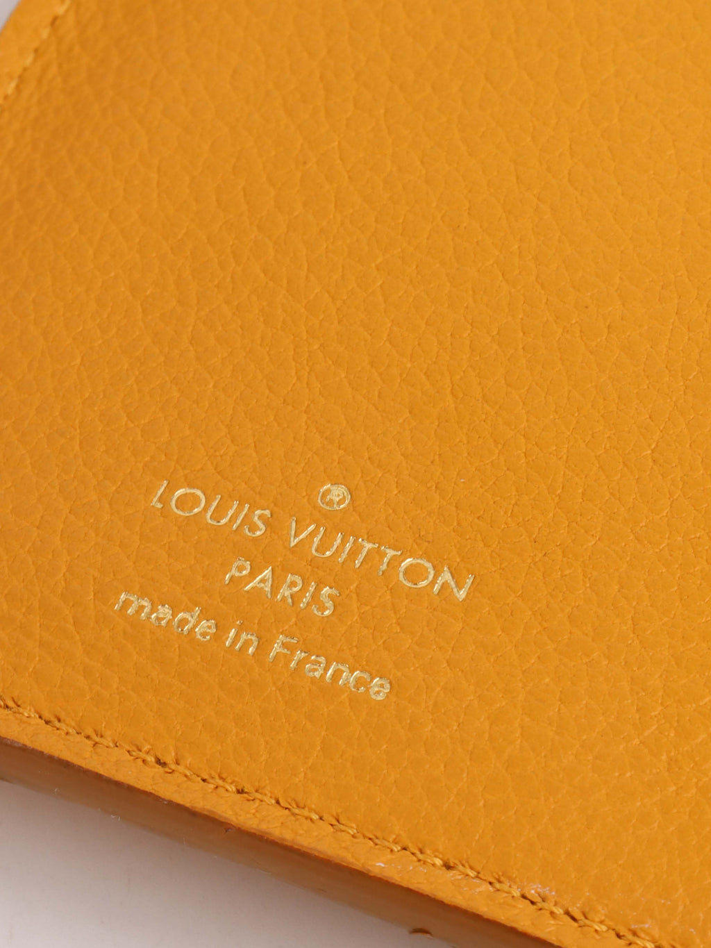 Louis Vuitton Saffran Empreinte Leather Compact Wallet.