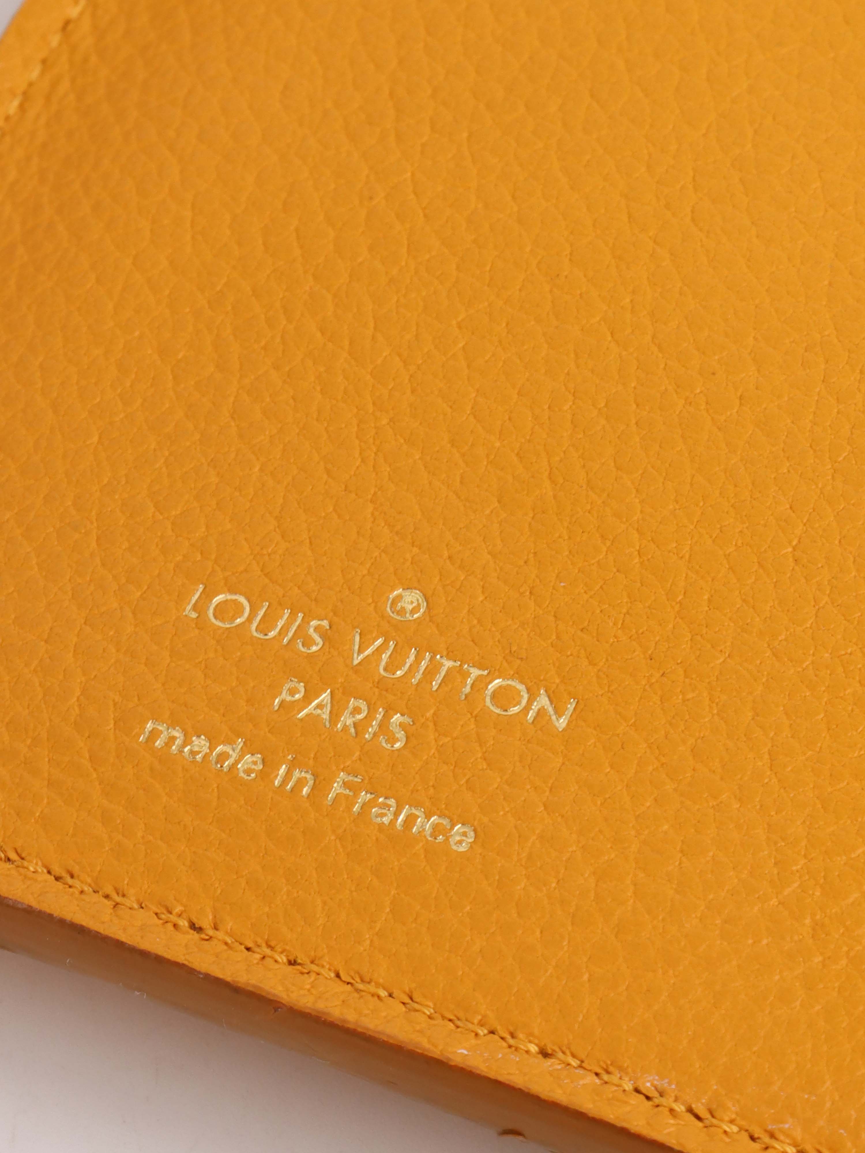 Louis Vuitton Saffran Empreinte Leather Compact Wallet.