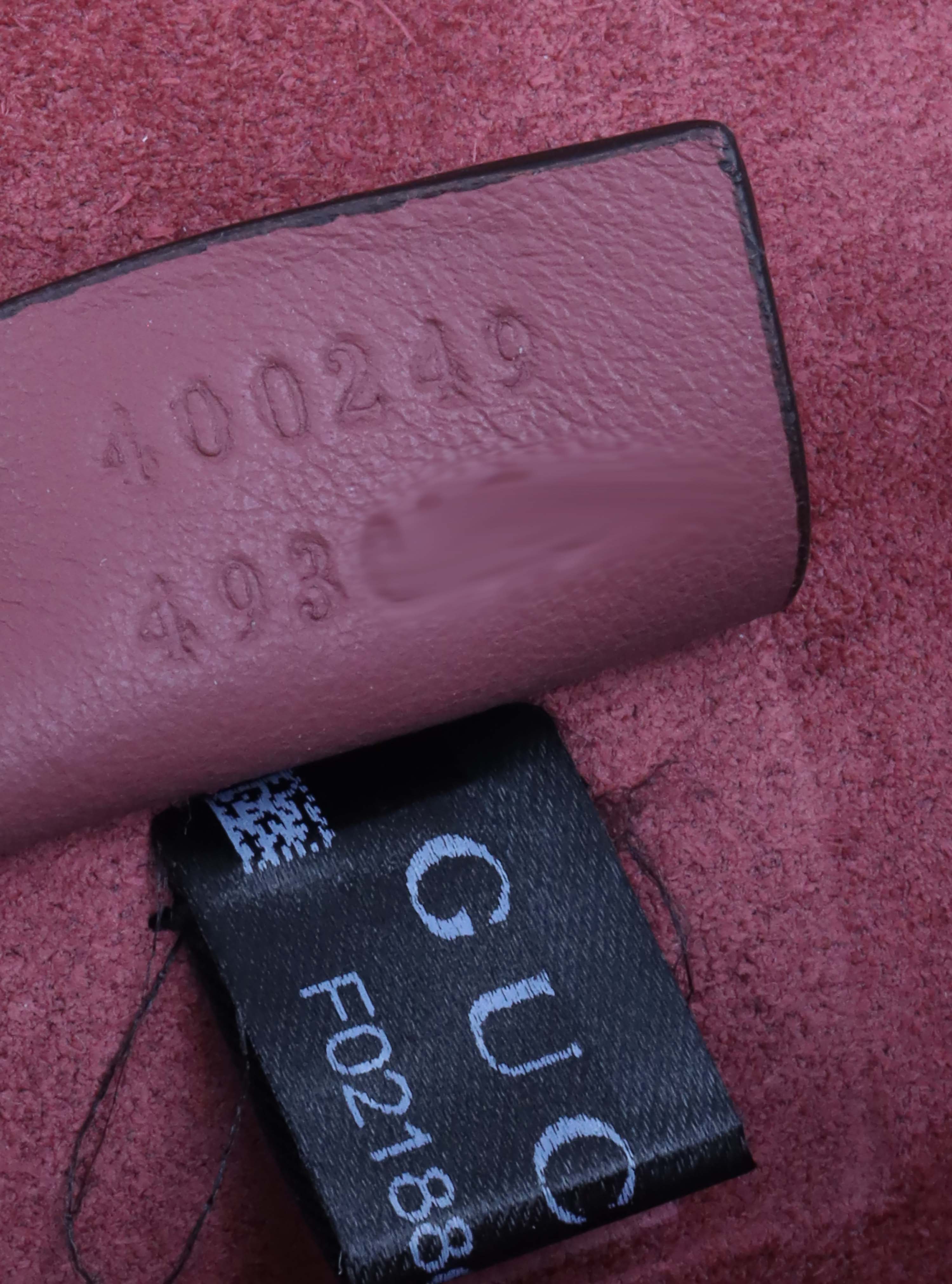 Gucci Small Dionysus Supreme Bloom Bag.