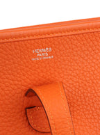 Hermes Evelyn III 29 in Feu Orange.