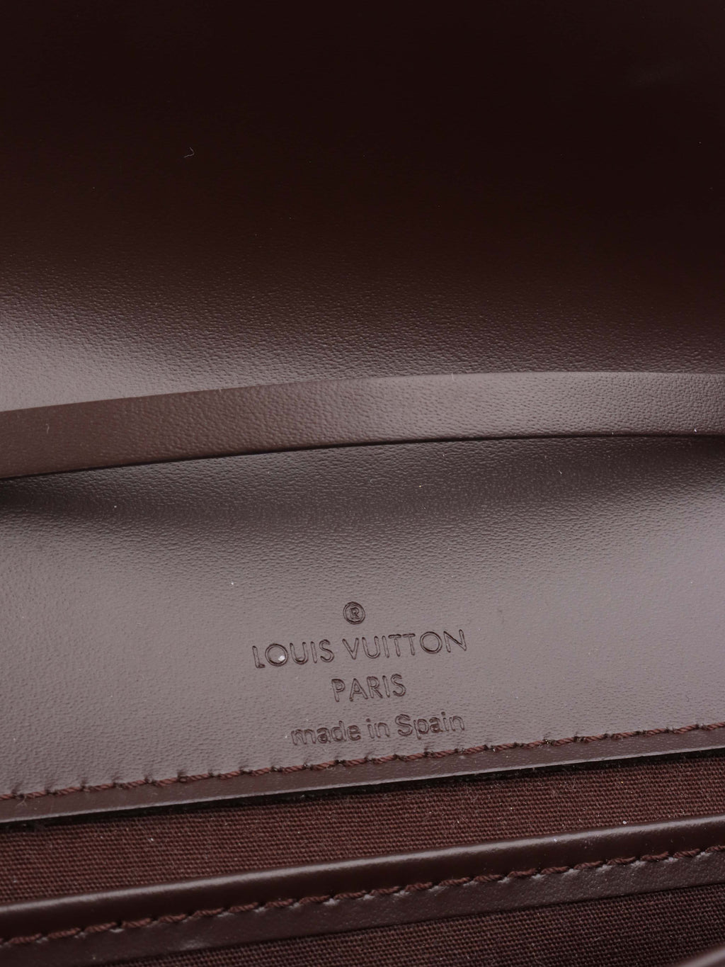 Louis Vuitton Brown Epi Leather Honfleur Clutch.