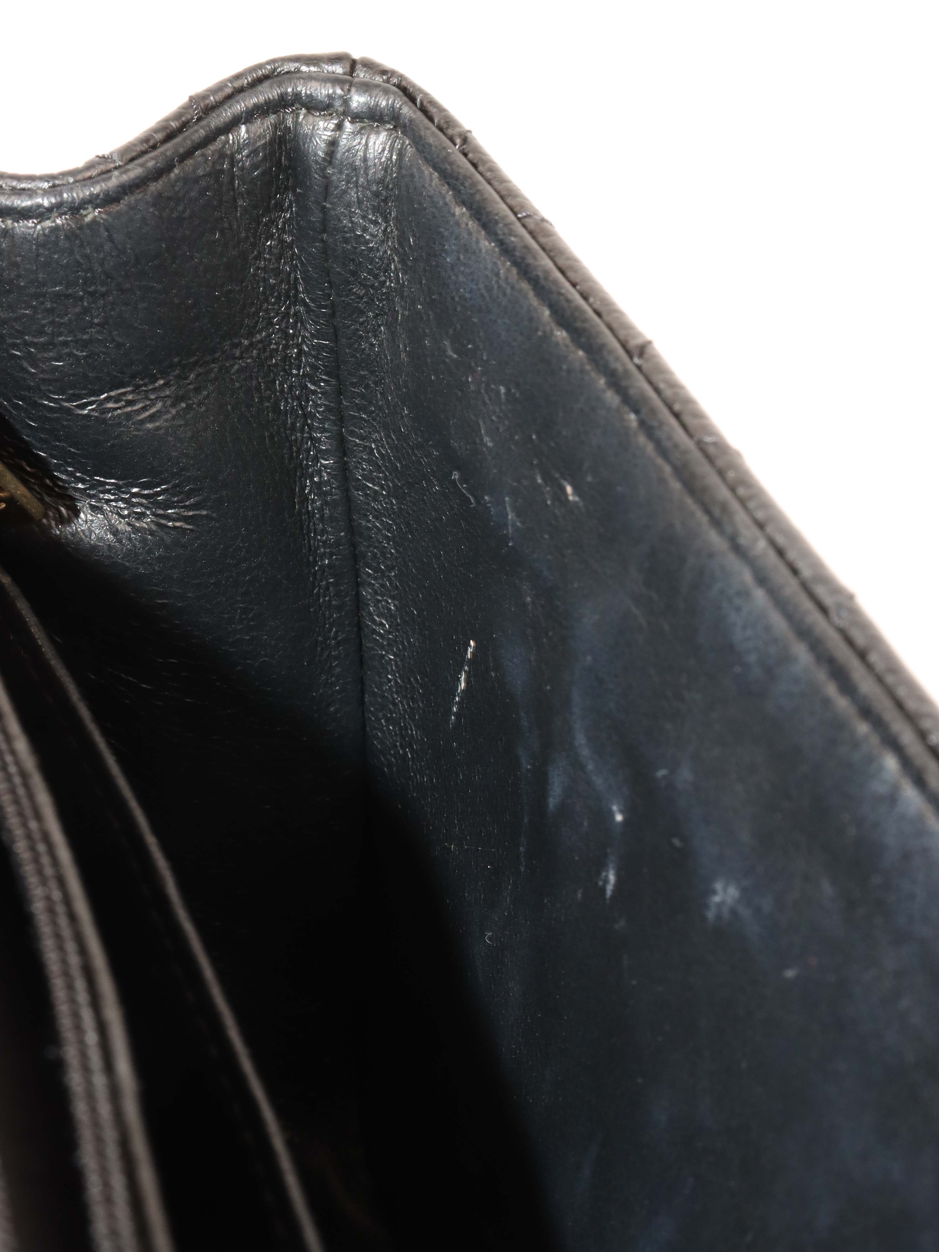 Chanel Black Mini Caviar Square Flap Bag.