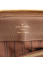 Louis Vuitton Terre Empreinte Monogram Audacieuse PM Bag.