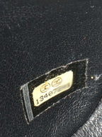 Chanel Black Mini Caviar Square Flap Bag.