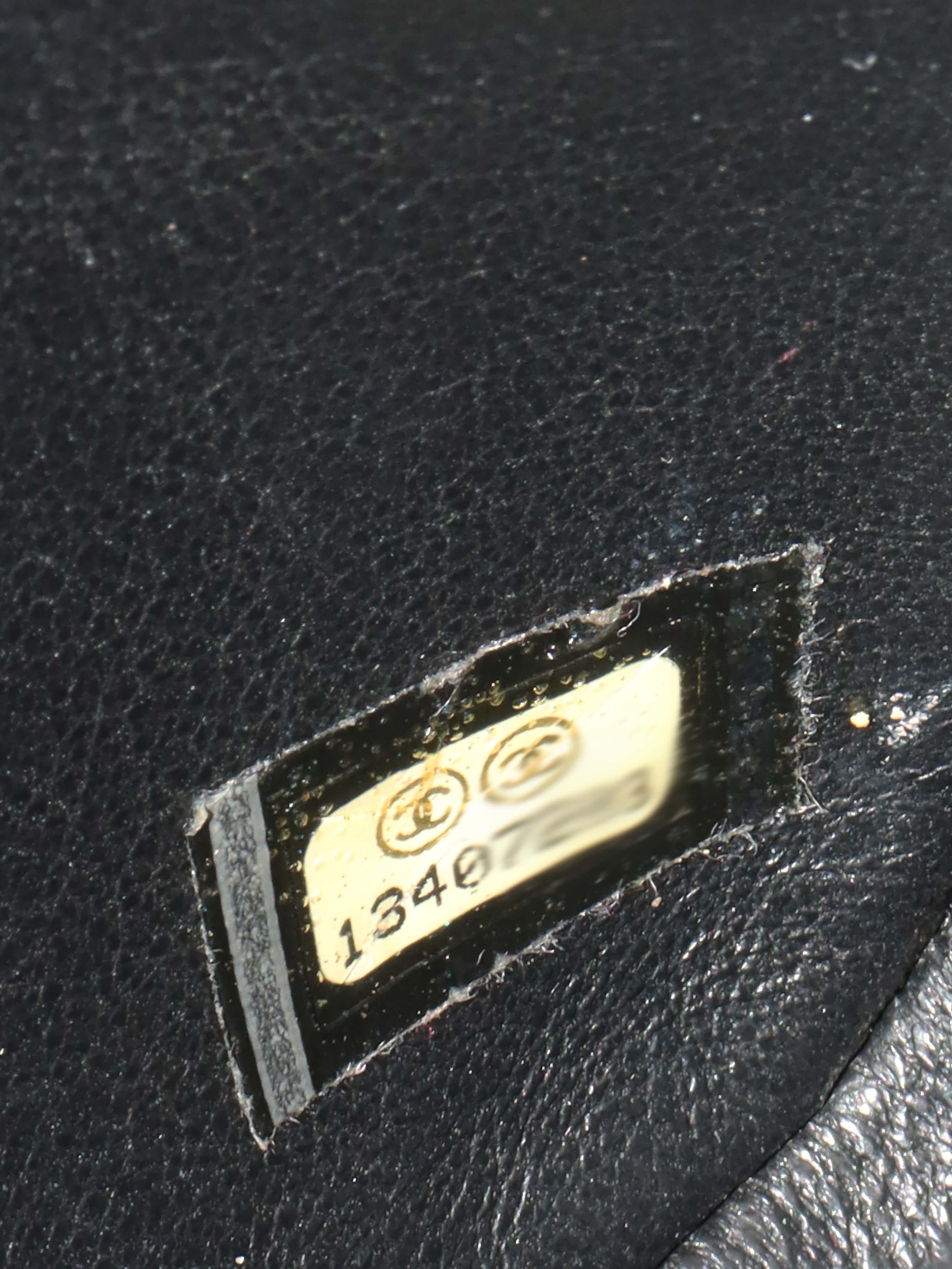 Chanel Black Mini Caviar Square Flap Bag.