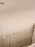 Chanel Jumbo Ivory Caviar Classic Flap.