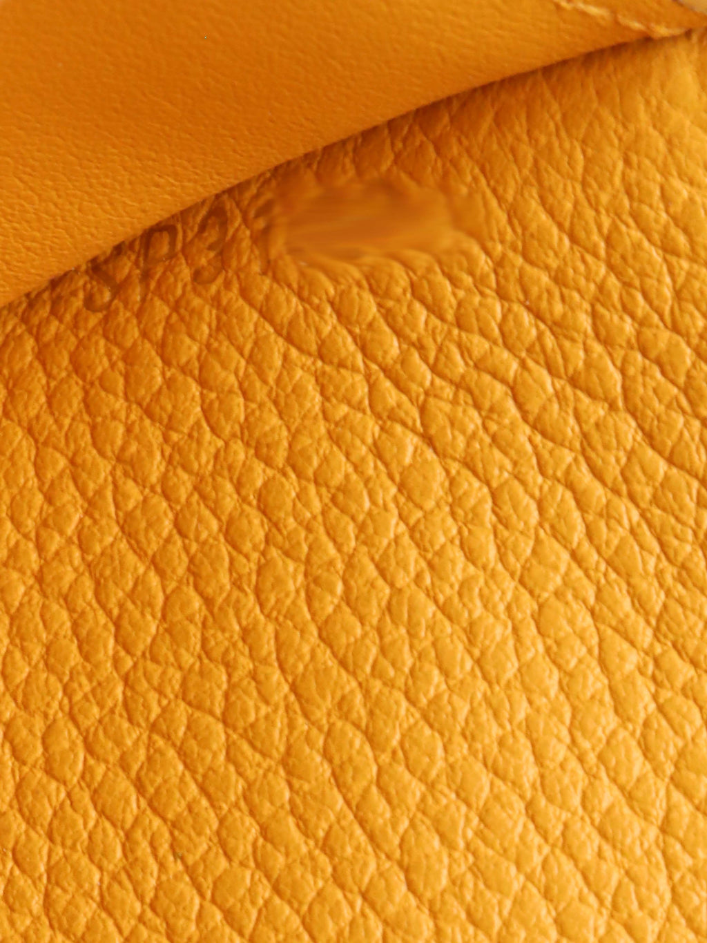 Louis Vuitton Saffran Empreinte Leather Compact Wallet.