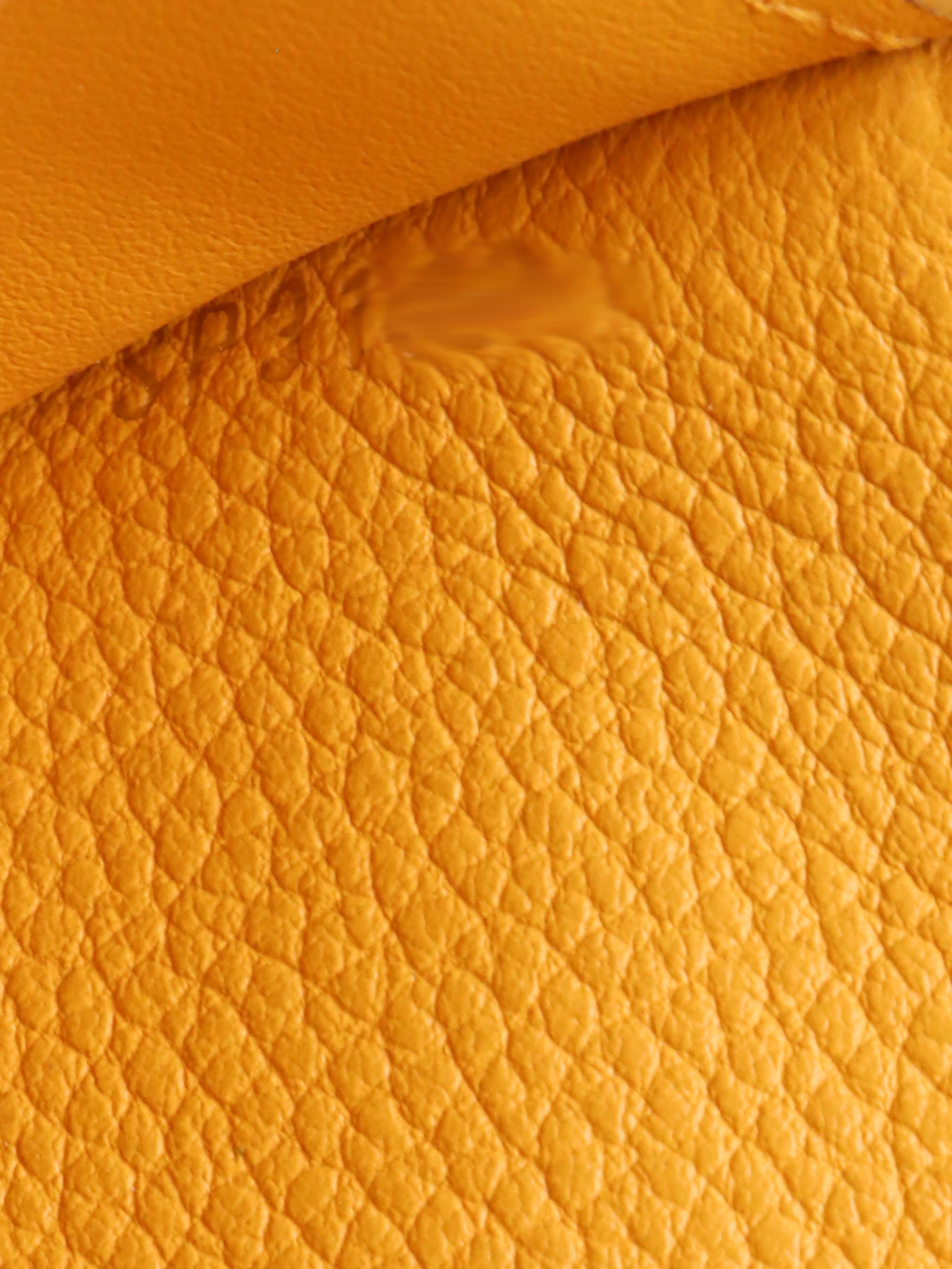 Louis Vuitton Saffran Empreinte Leather Compact Wallet.