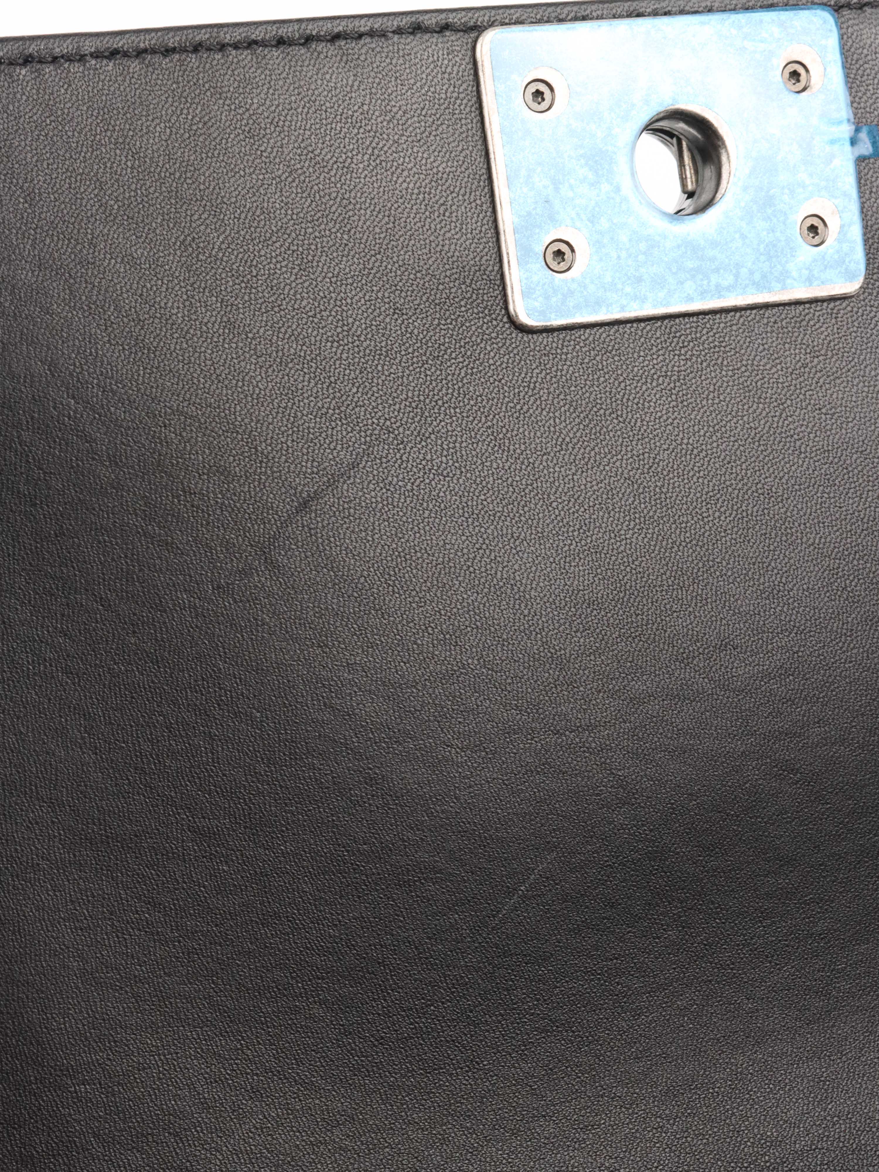 Chanel Black Lambskin Medium Boy Bag Ruthenium Finish Metal Hardware.