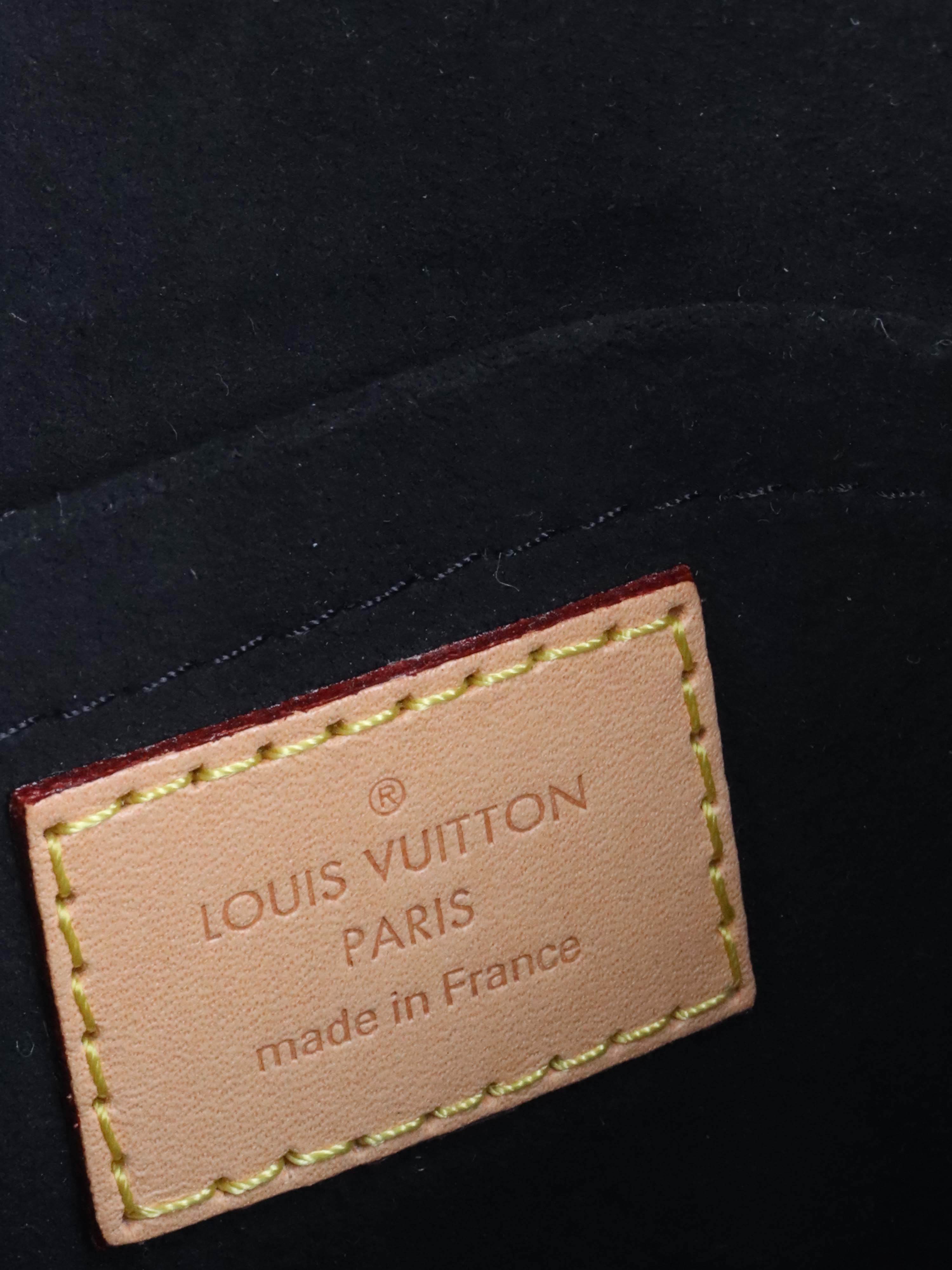 Louis Vuitton Monogram Duffle Bag.