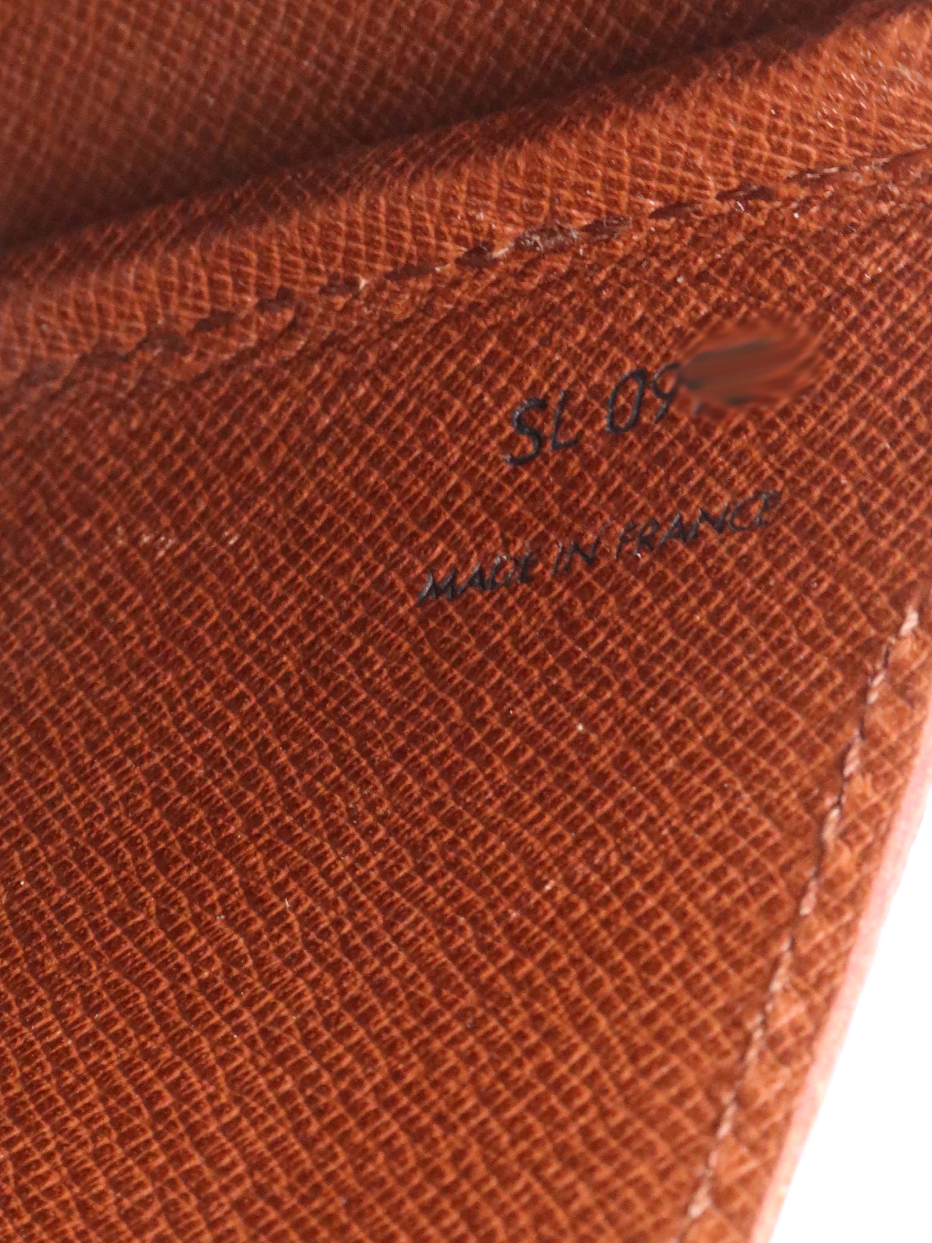 Louis Vuitton Monogram Cartouchiere PM Bag.