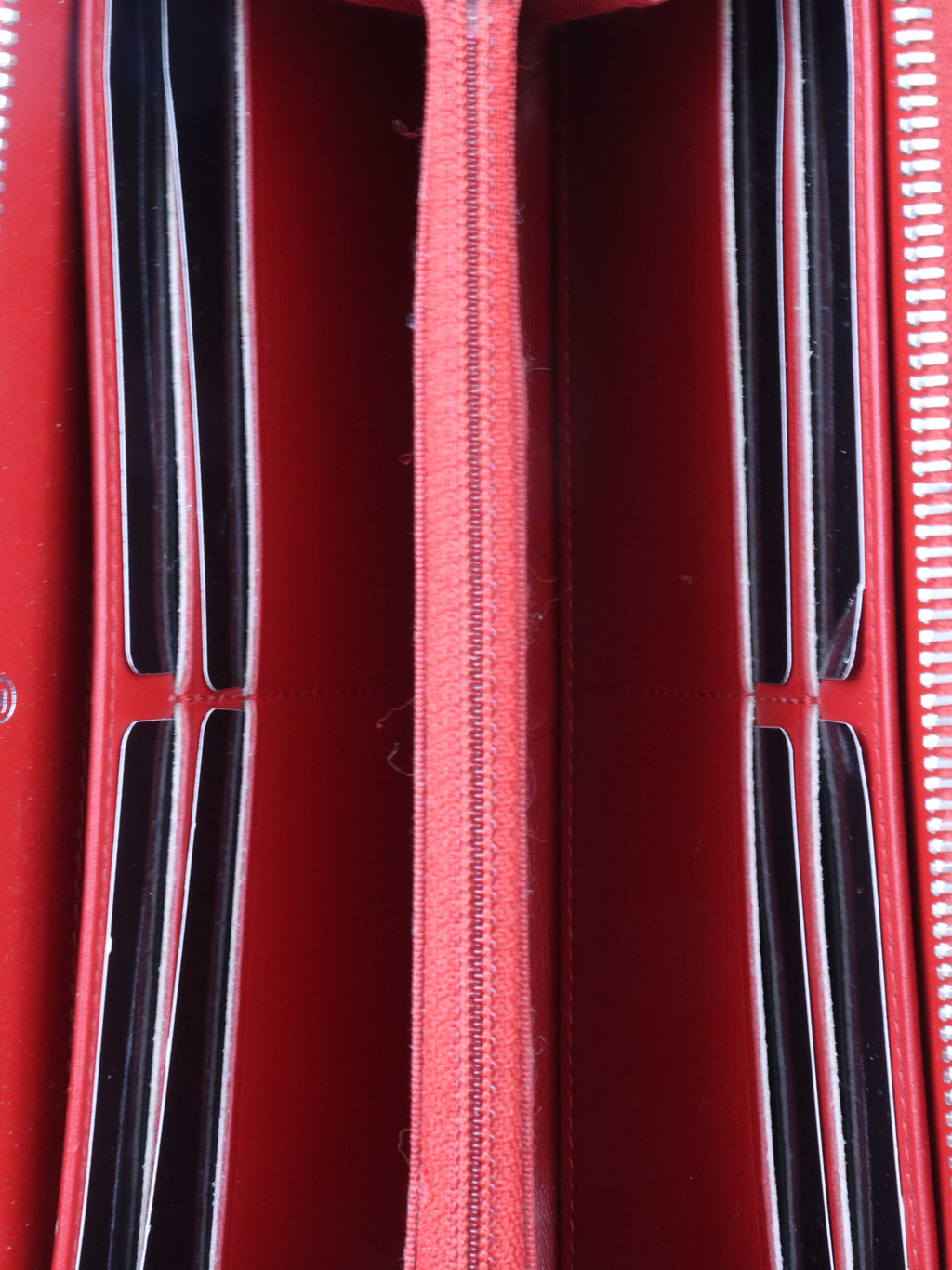Chanel Red Caviar Zip Around Wallet.