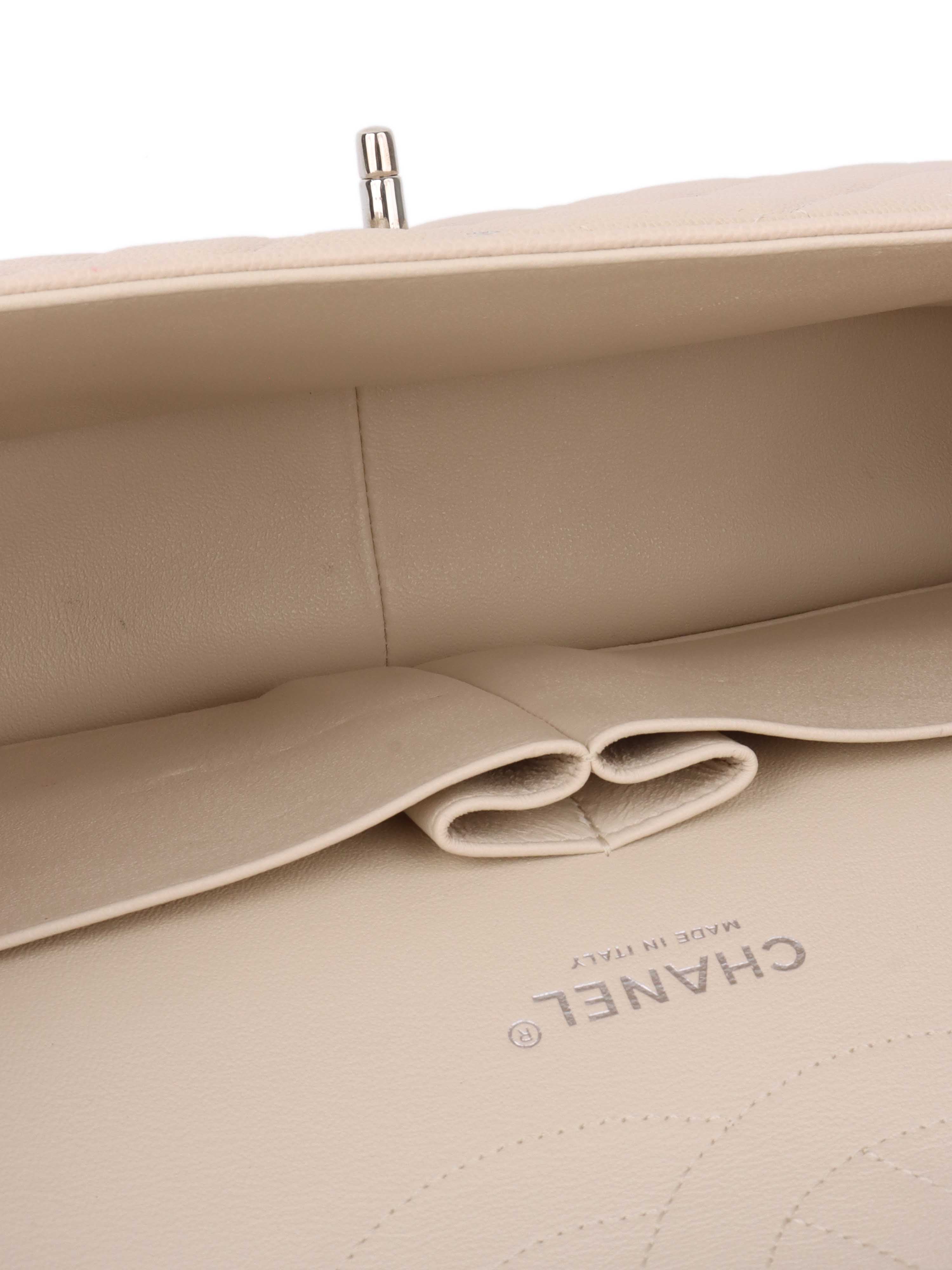 Chanel Jumbo Ivory Caviar Classic Flap.