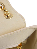 Louis Vuitton Cream Monogram Empreinte Saint Germain PM Bag.