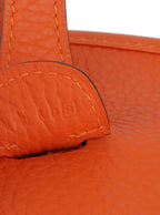 Hermes Evelyn III 29 in Feu Orange.