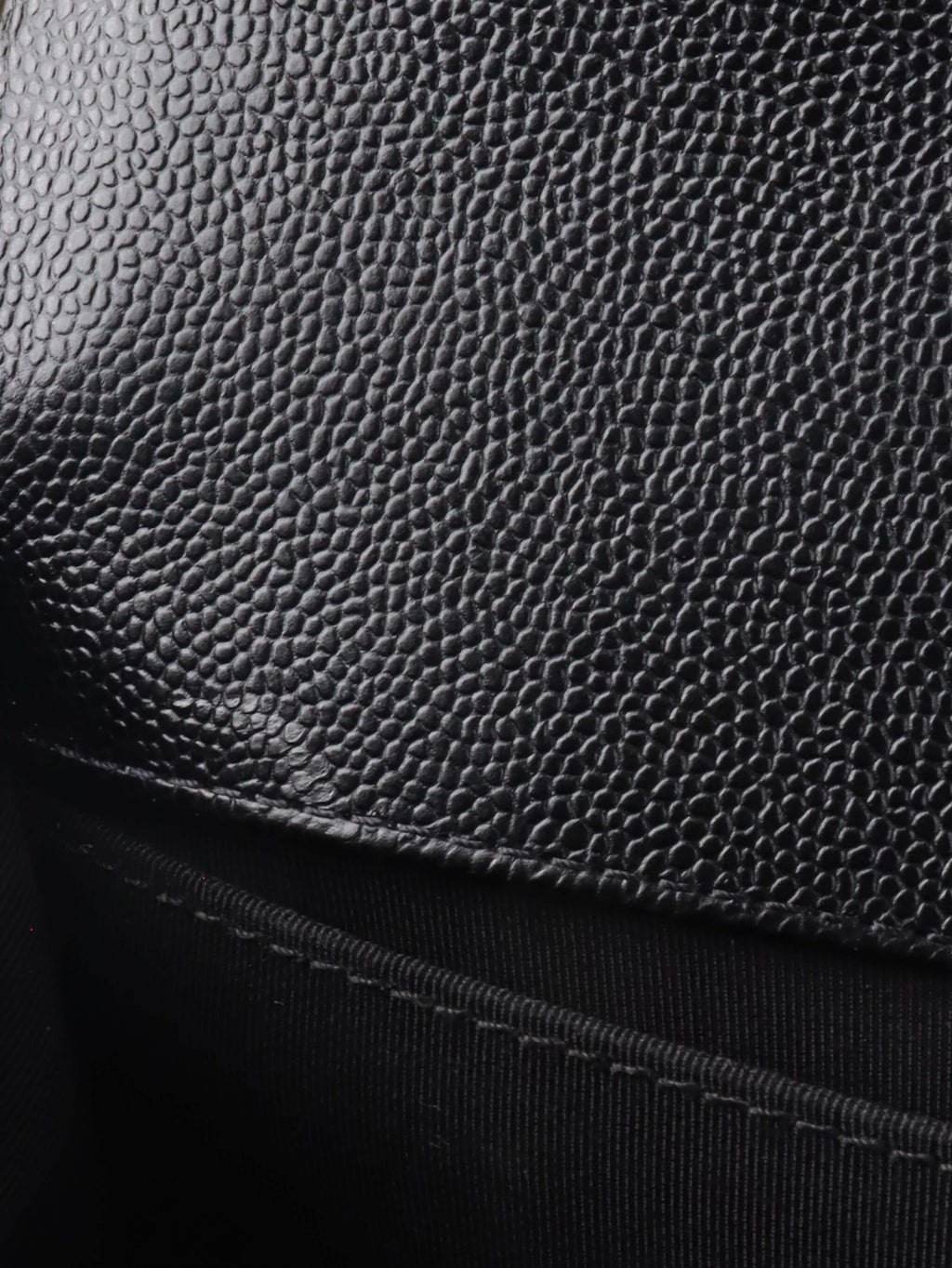 Chanel Black Chevron Caviar Medium Boy Bag.