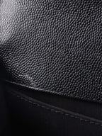 Chanel Black Chevron Caviar Medium Boy Bag.