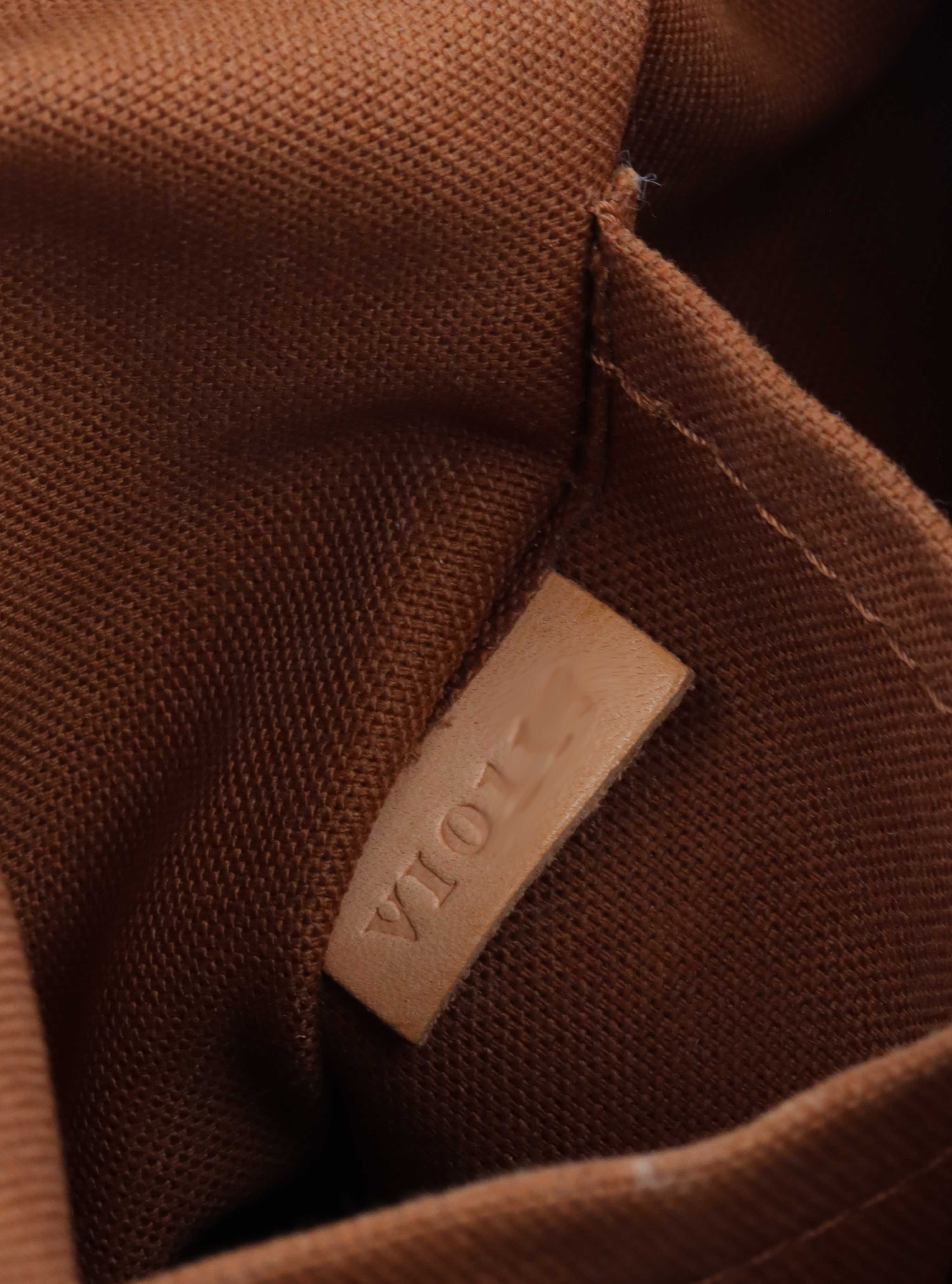 Louis Vuitton Monogram Tivoli PM Bag.