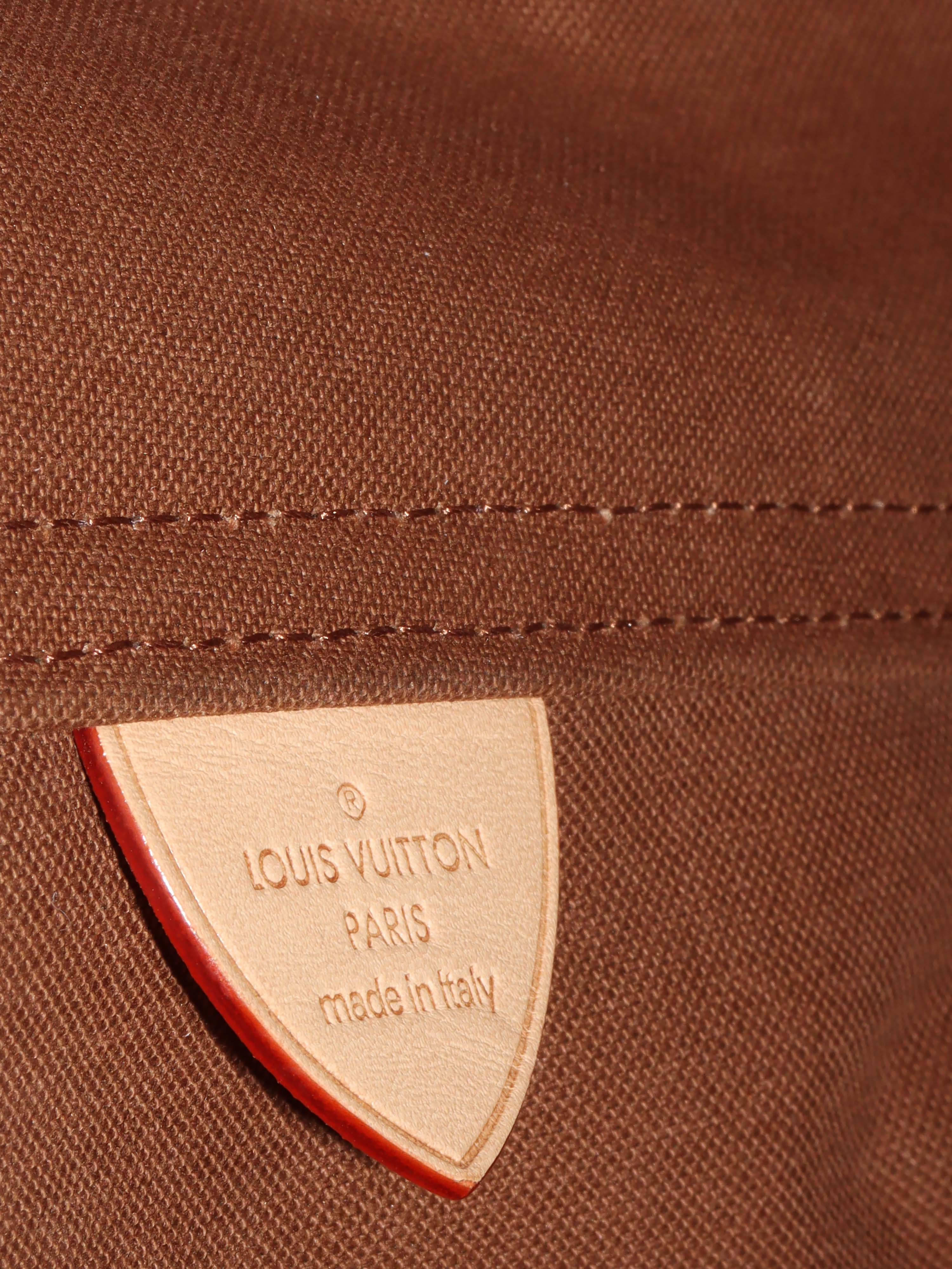 Louis Vuitton Atlantis GM Bag.