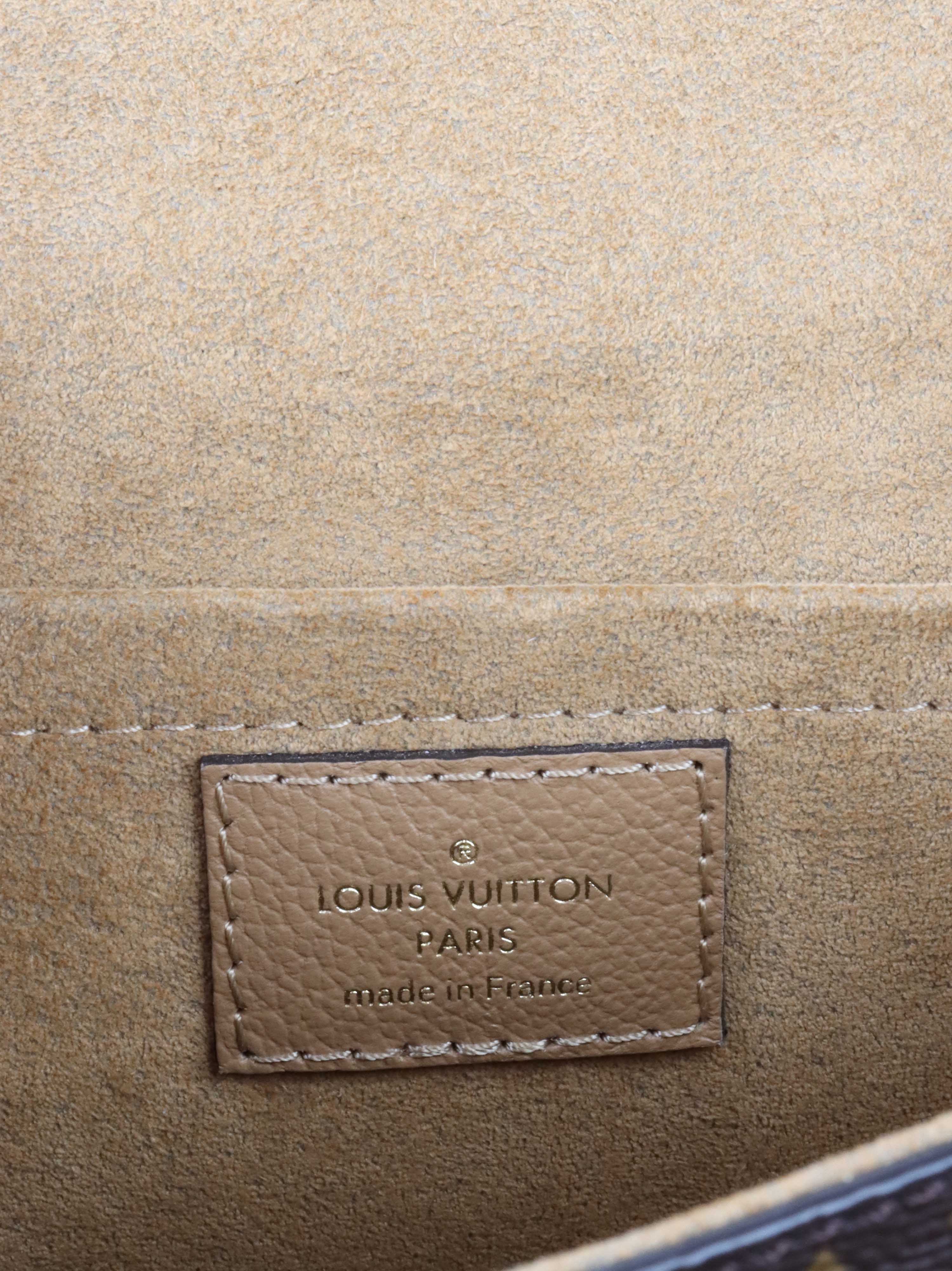 Louis Vuitton Marignan Beige Bag.