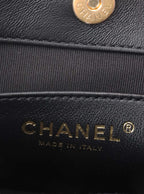 Chanel Black Small Quilted Velvet Wavy CC Hobo Bag.