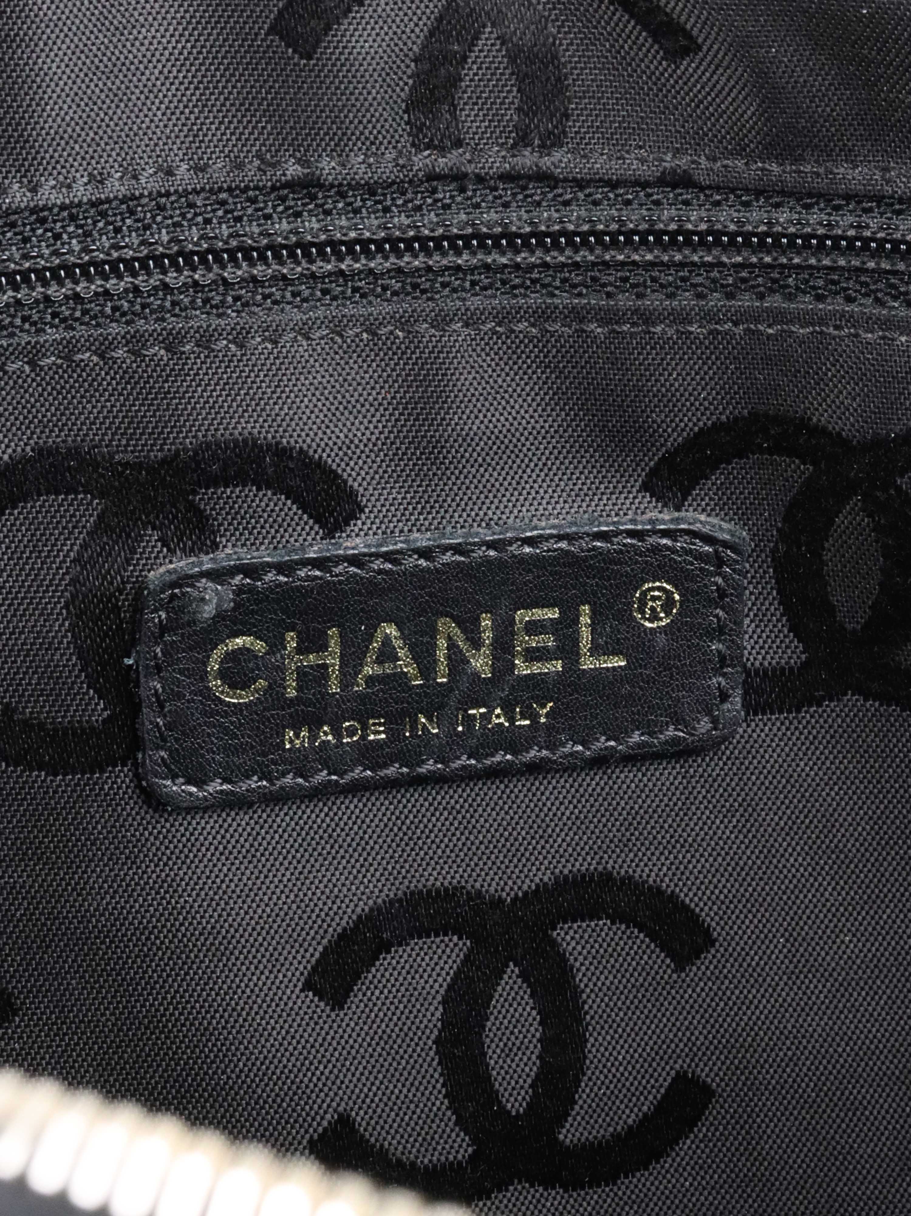 Chanel Black with Gold Trim Bowling Bag.