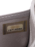 Chanel Black Camellia Wallet.