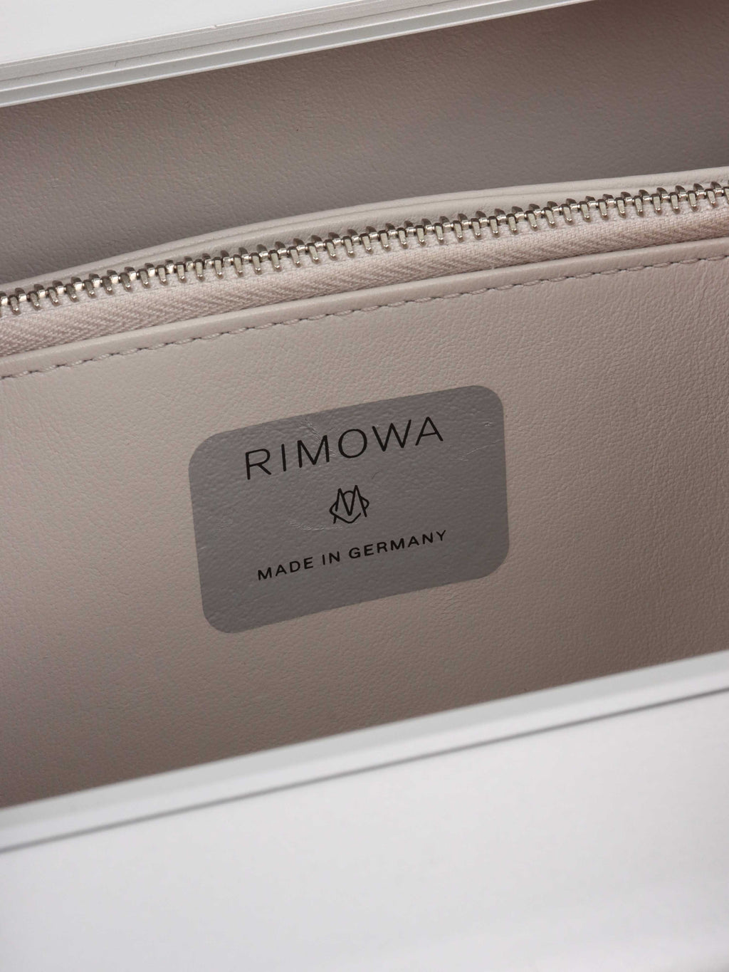 Dior x RIMOWA Silver Personal Clutch Case.