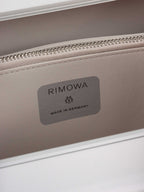 Dior x RIMOWA Silver Personal Clutch Case.