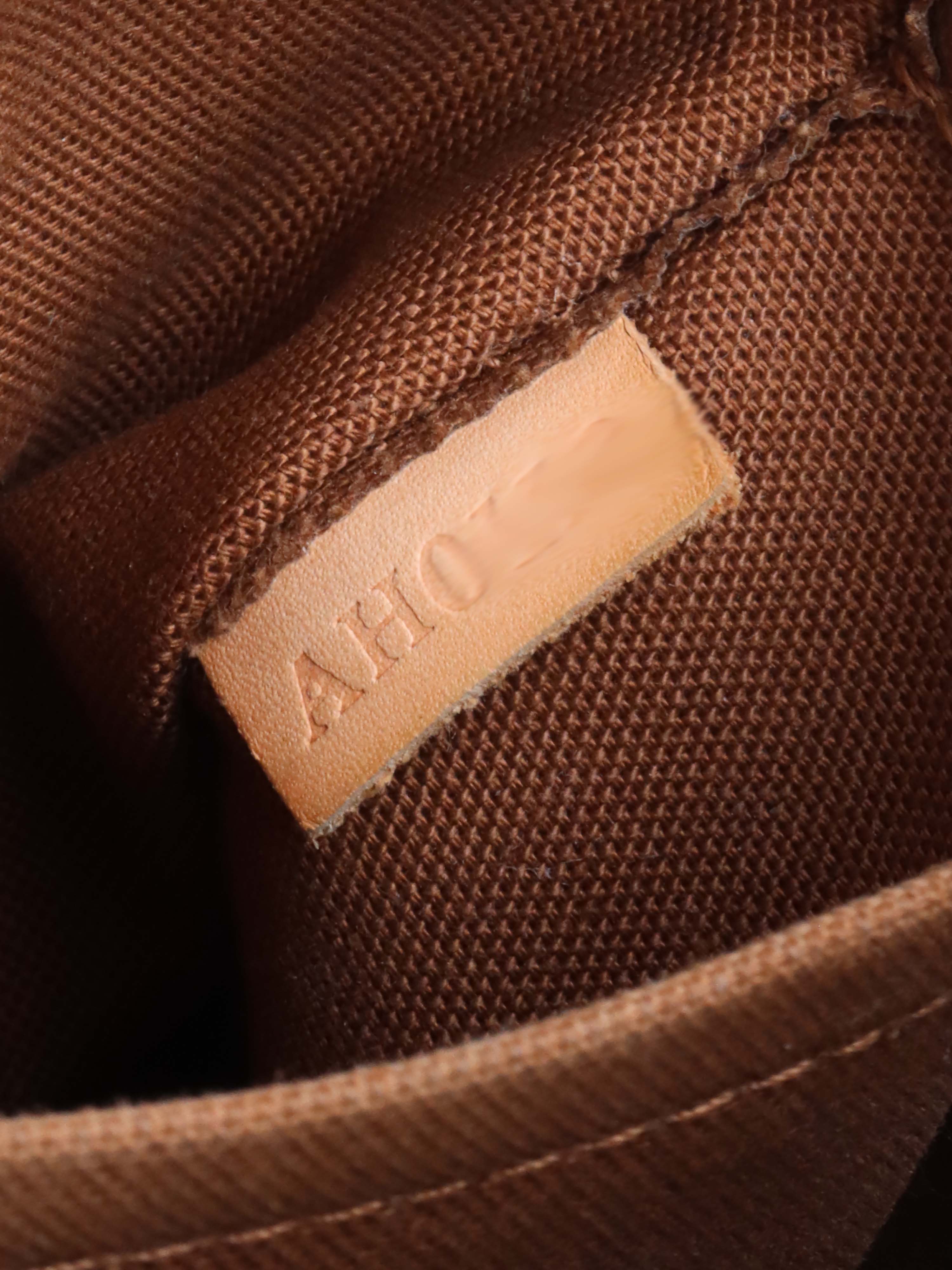 Louis Vuitton Tivoli Monogram PM Bag