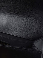 Chanel Black Chevron Caviar Medium Boy Bag.