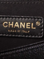Chanel Black Chevron Caviar Medium Boy Bag.