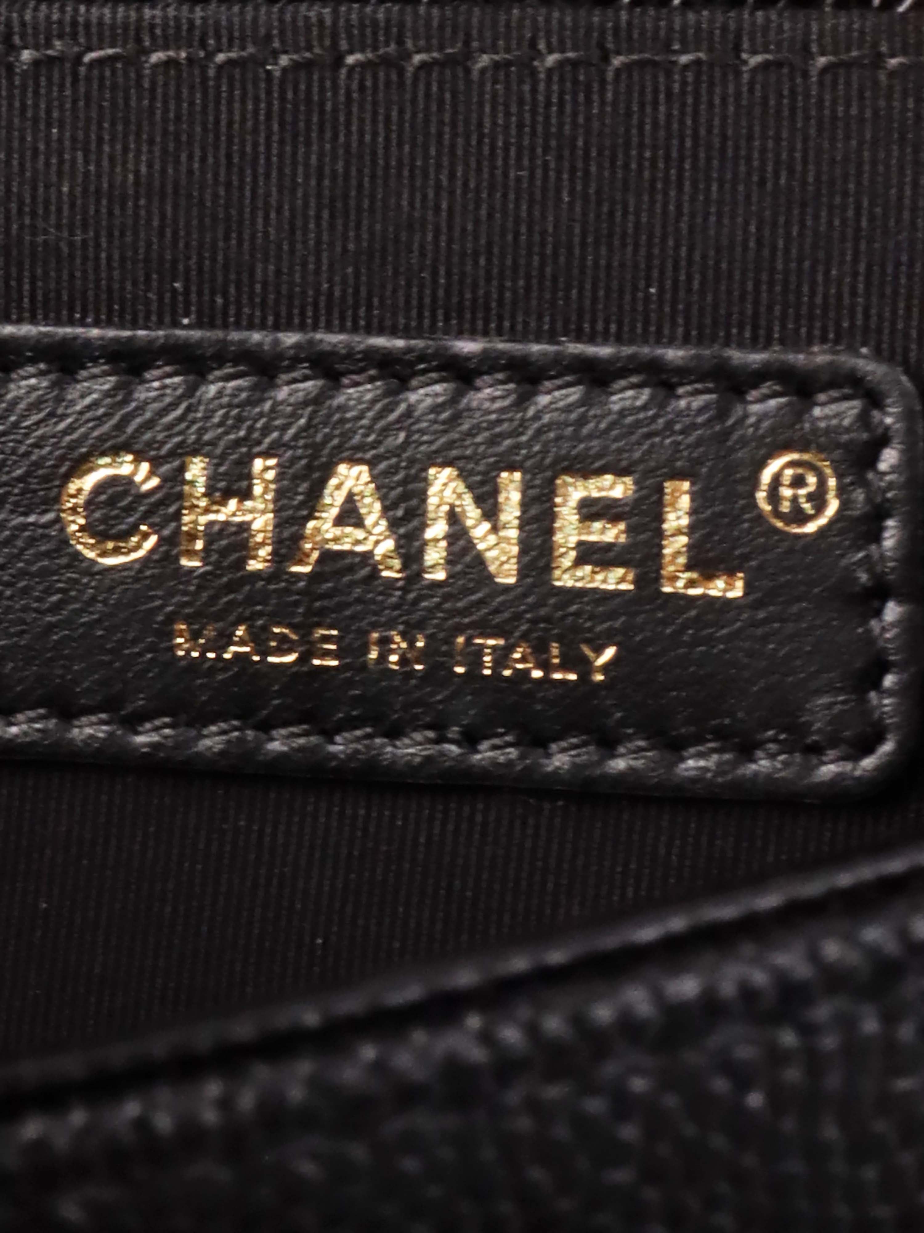 Chanel Black Chevron Caviar Medium Boy Bag.