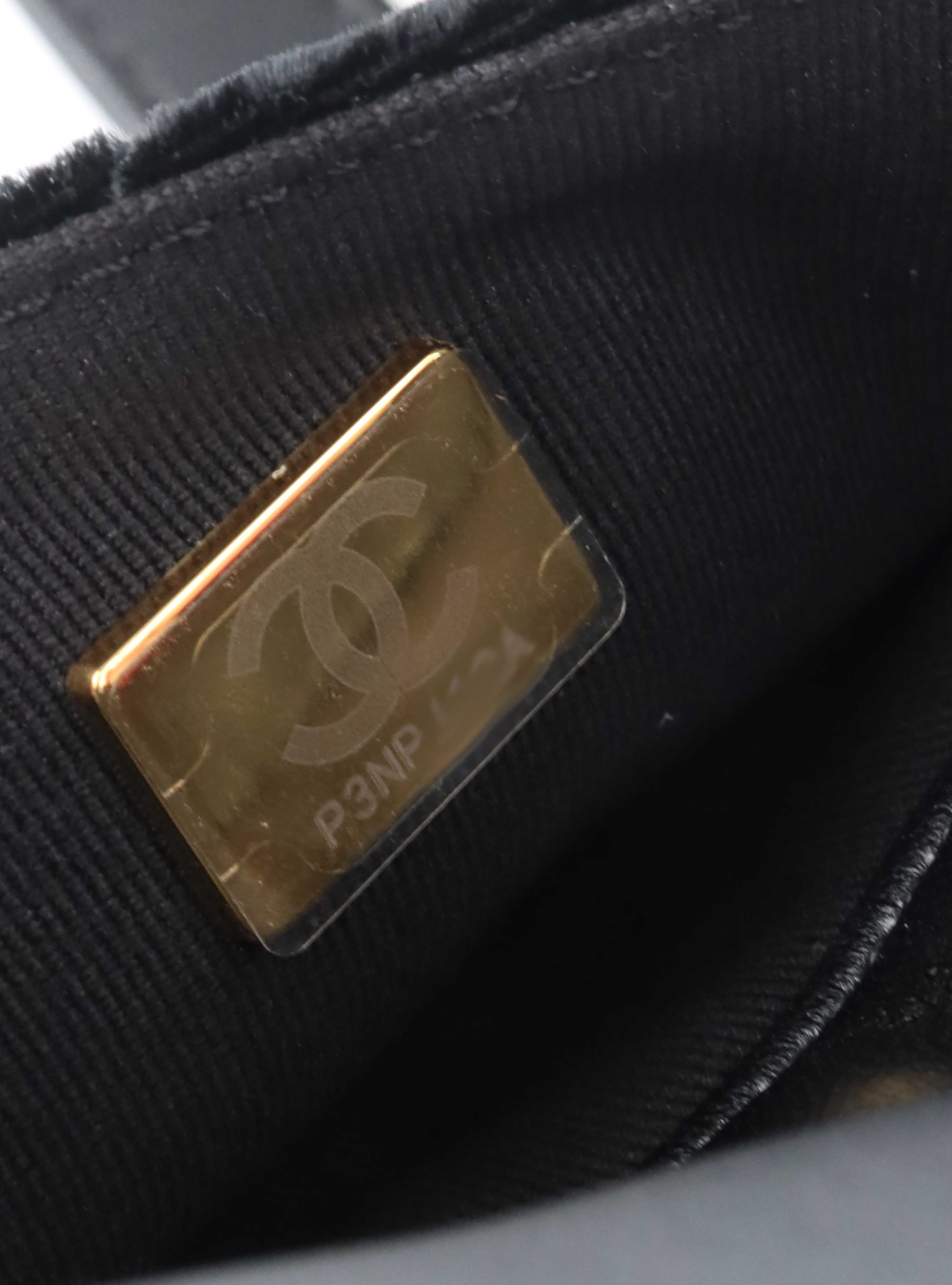 Chanel Black Small Quilted Velvet Wavy CC Hobo Bag.