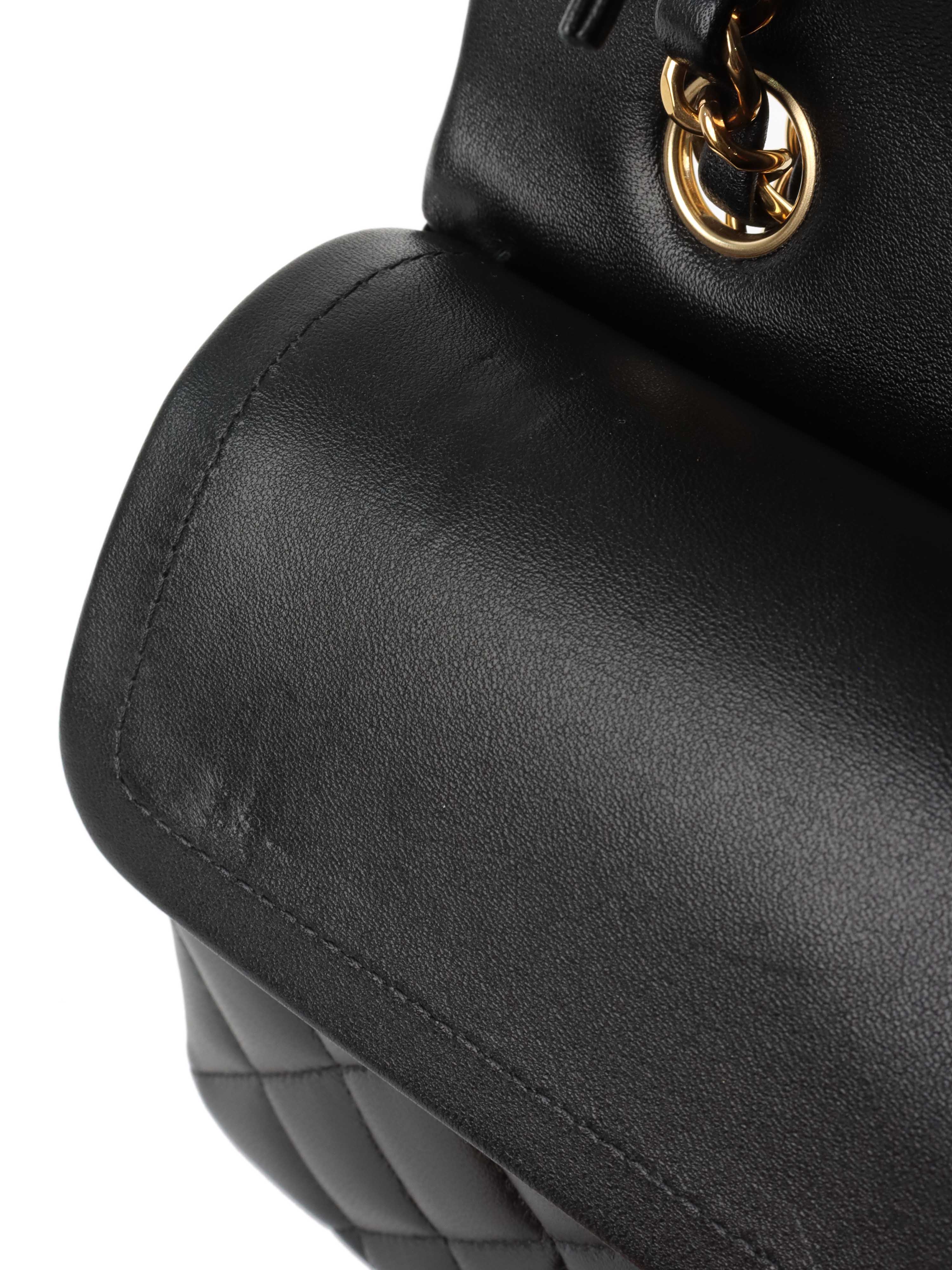 Chanel Small Black Lambskin Classic Flap.