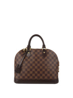 Louis Vuitton Damier Ebene Alma PM.