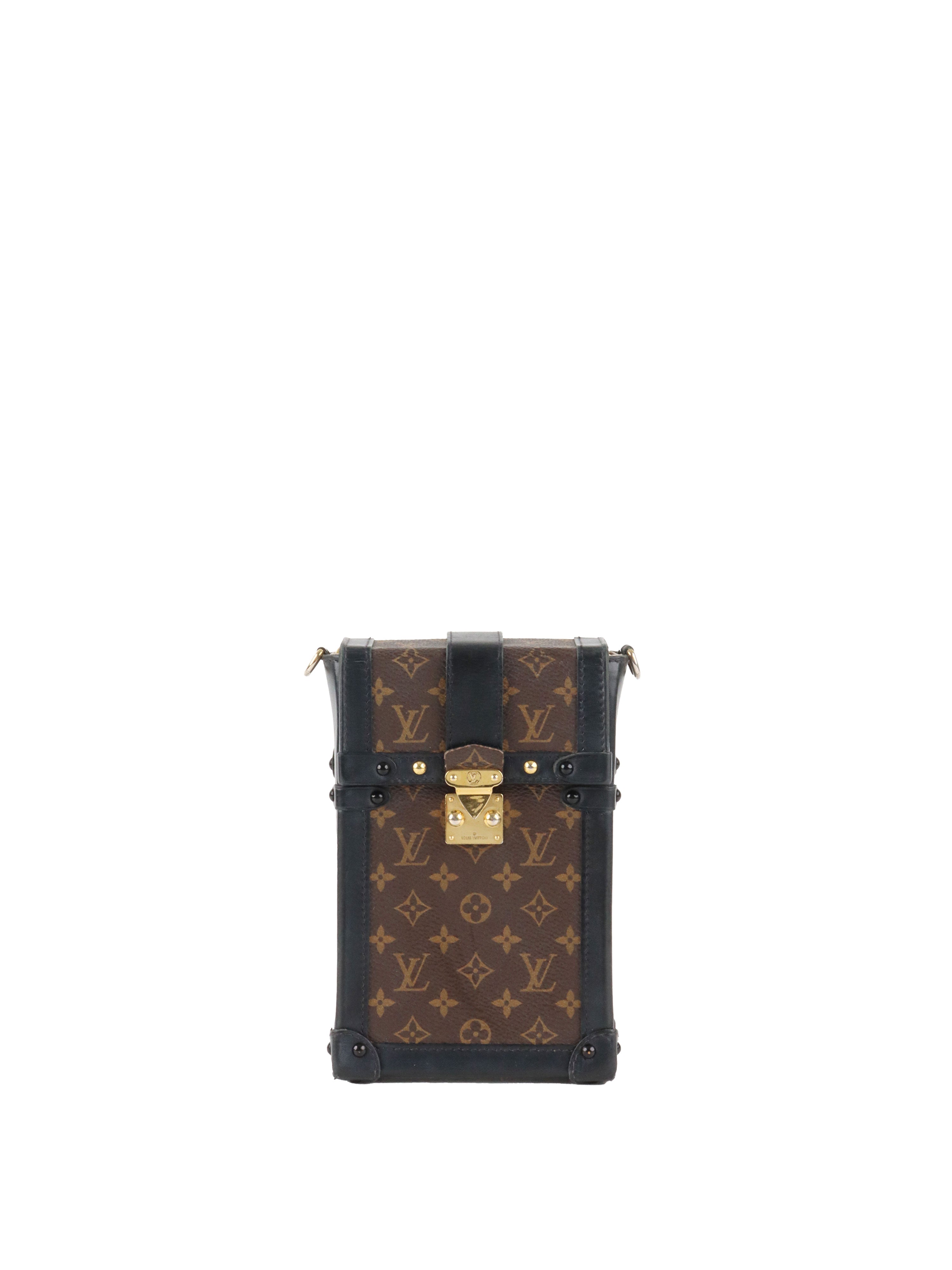 Louis Vuitton monogram Vertical Trunk Pochette.