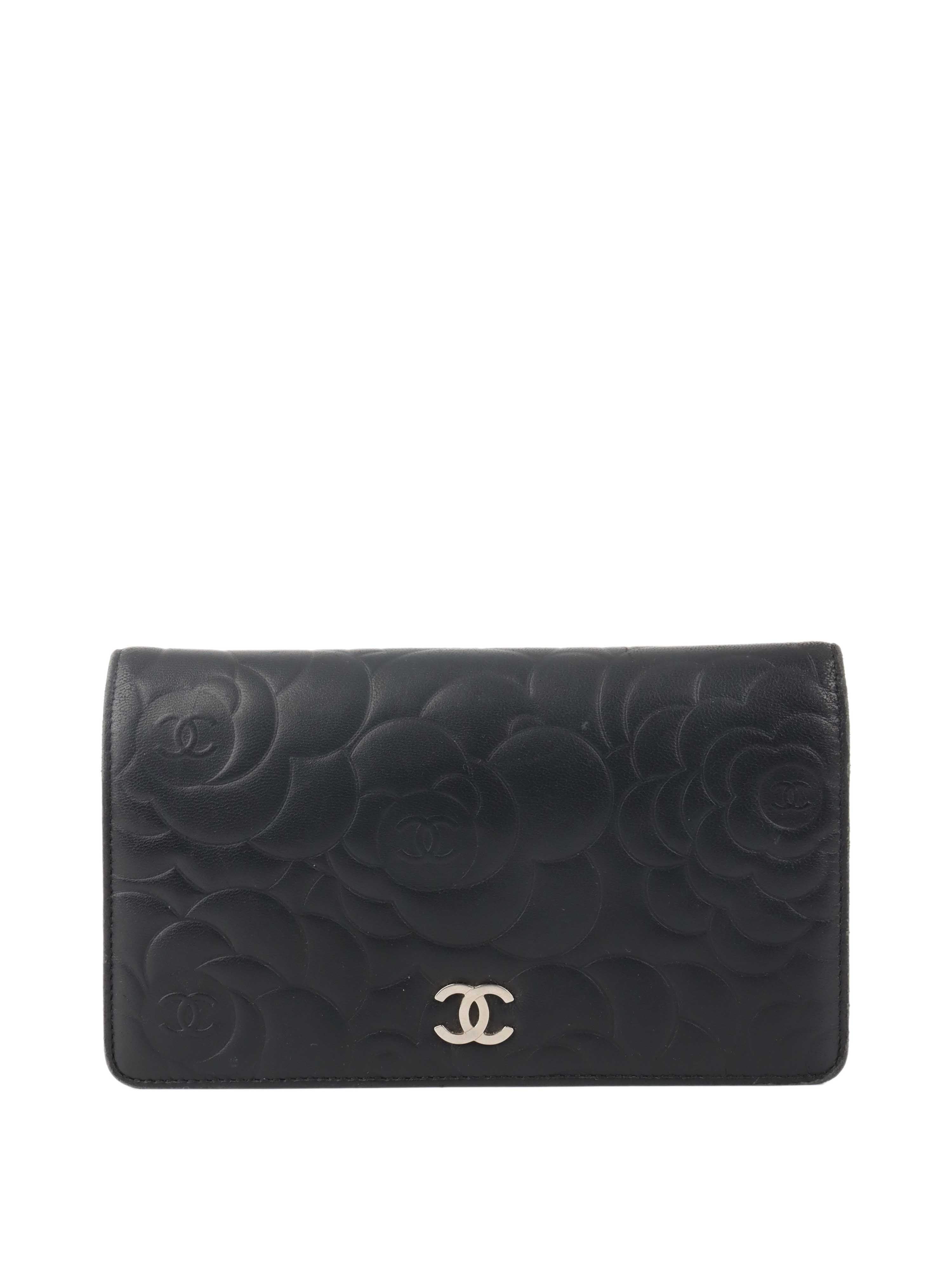 Chanel Black Camellia Wallet.