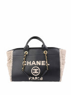 Chanel Black & Raffia Deauville Tote.