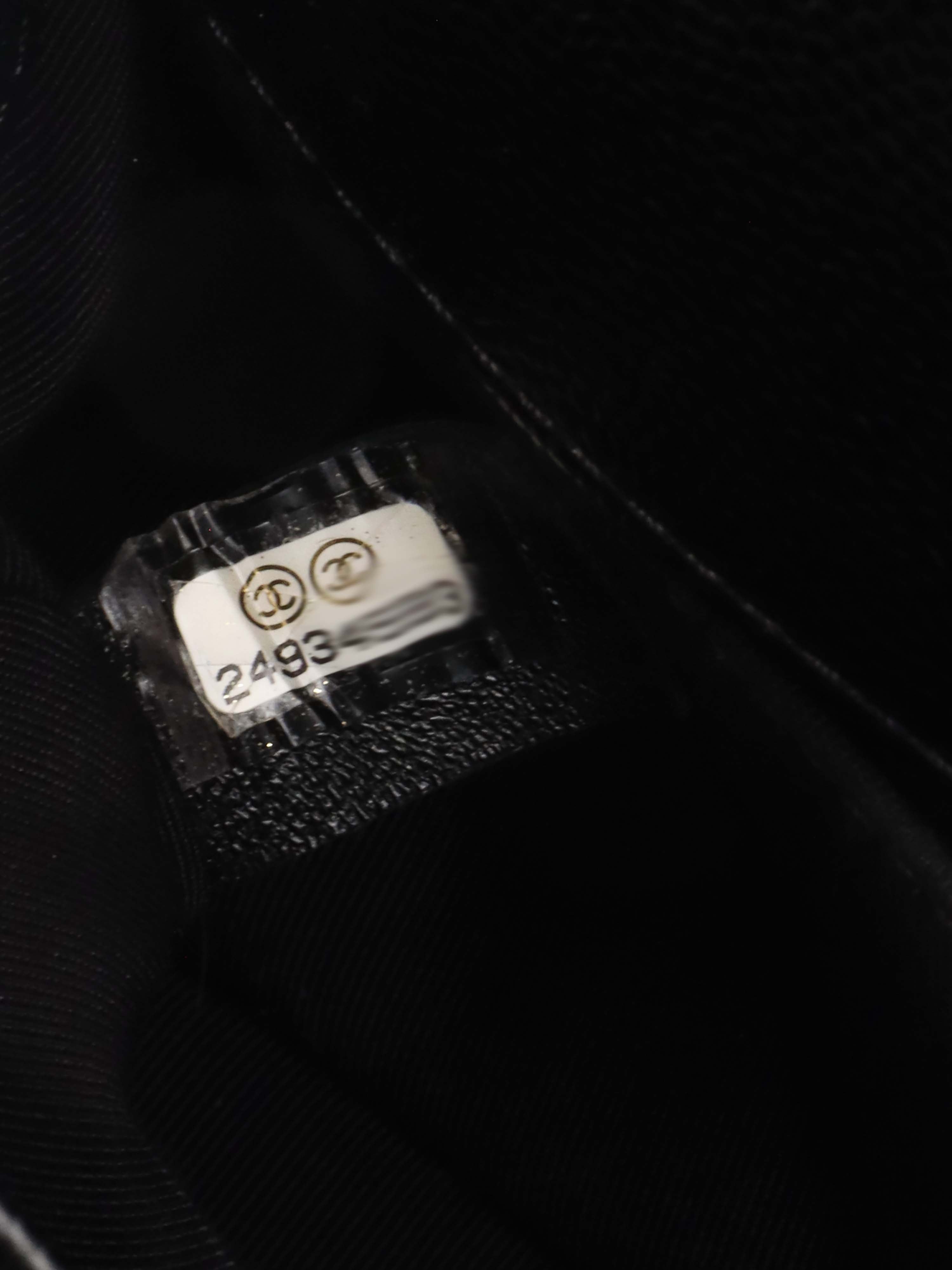 Chanel Black Chevron Caviar Medium Boy Bag.