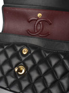 Chanel Small Black Lambskin Classic Flap.