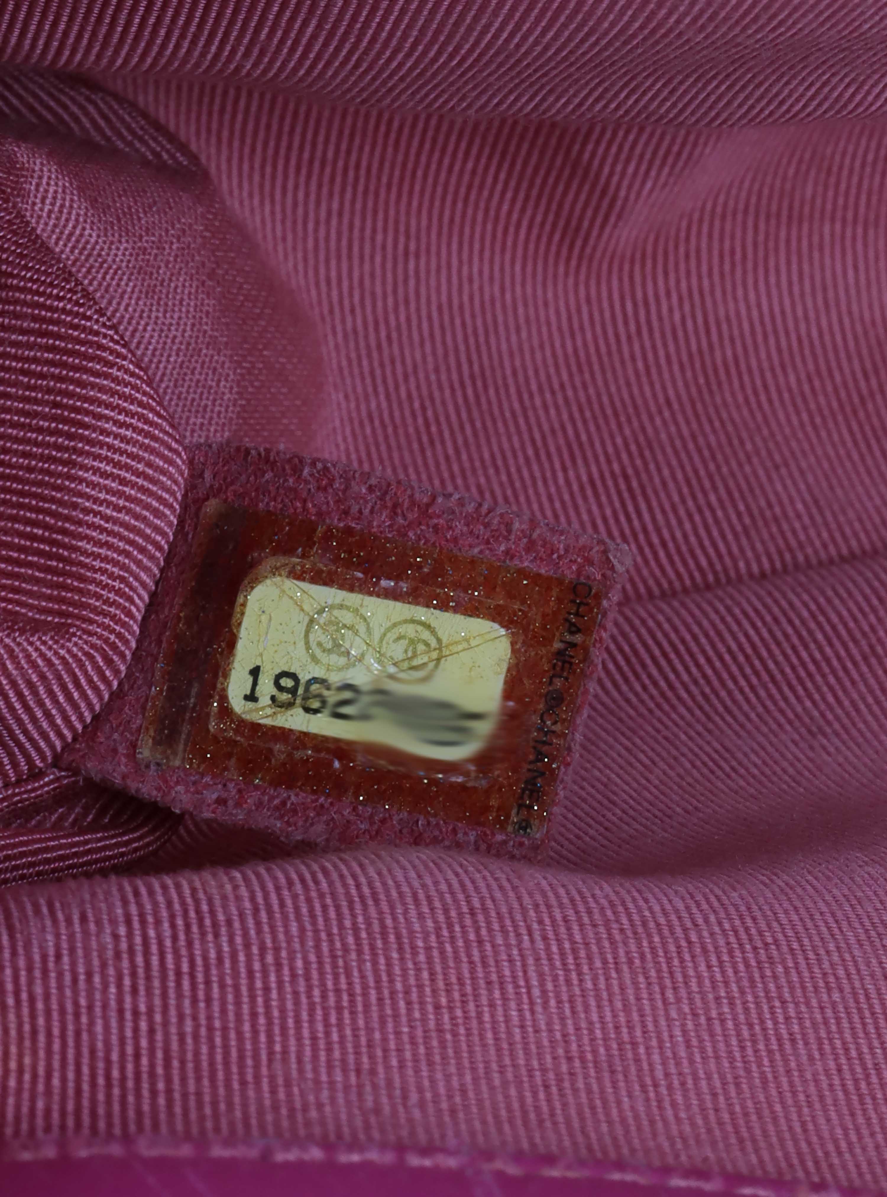 Chanel Medium Pink Tweed Boy Bag.